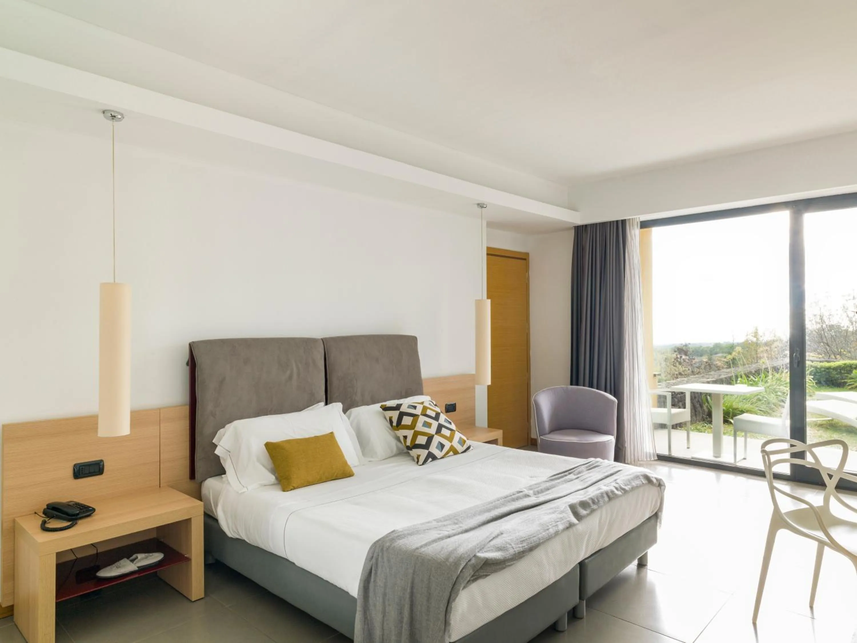 Bed in Esperia Palace Hotel & Resort Spa