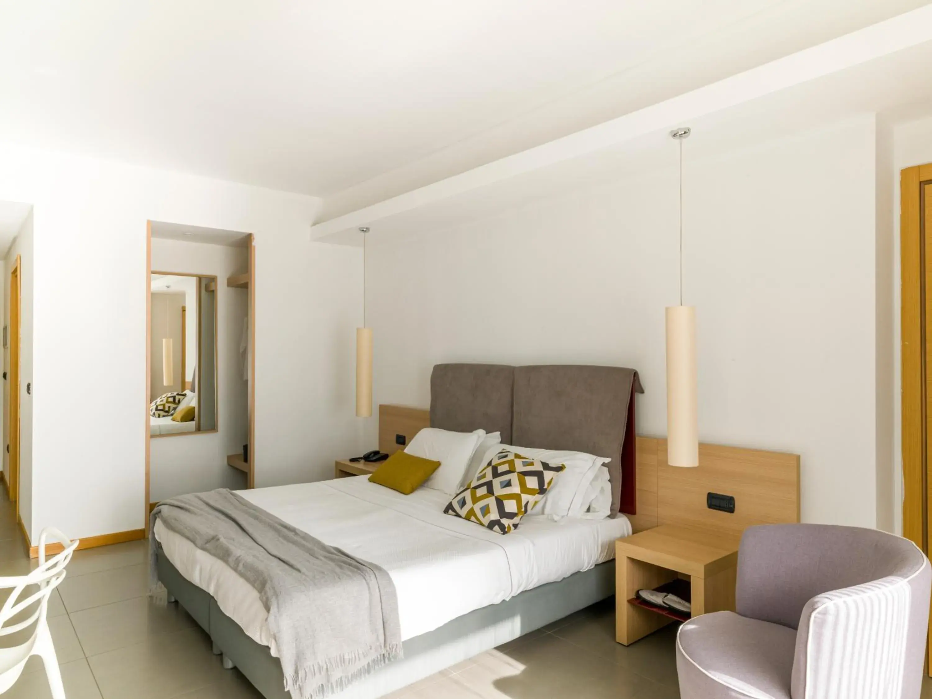 Bed in Esperia Palace Hotel & Resort Spa Bed in Esperia Palace Hotel & Resort Spa