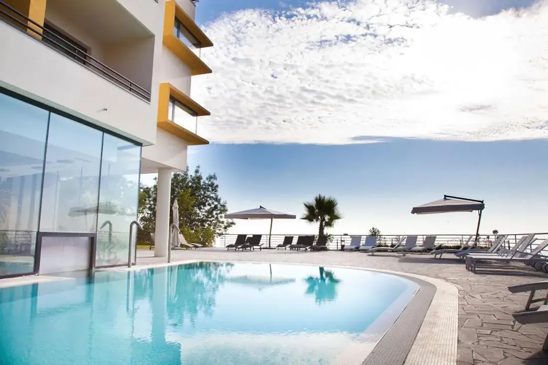 Pool view in Esperia Palace Hotel & Resort Spa Pool view in Esperia Palace Hotel & Resort Spa