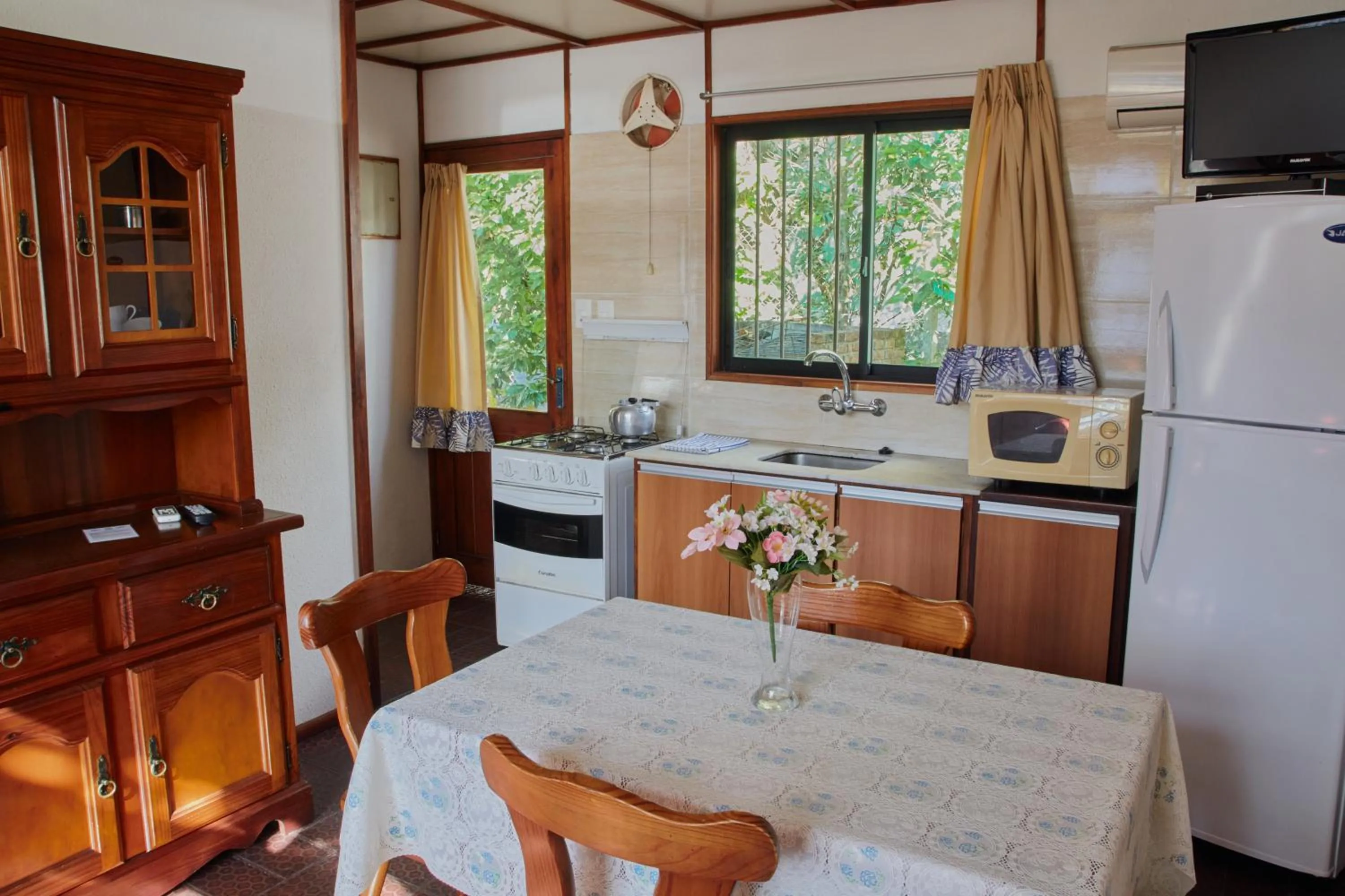 Kitchen or kitchenette in Paradise Complejo Turístico