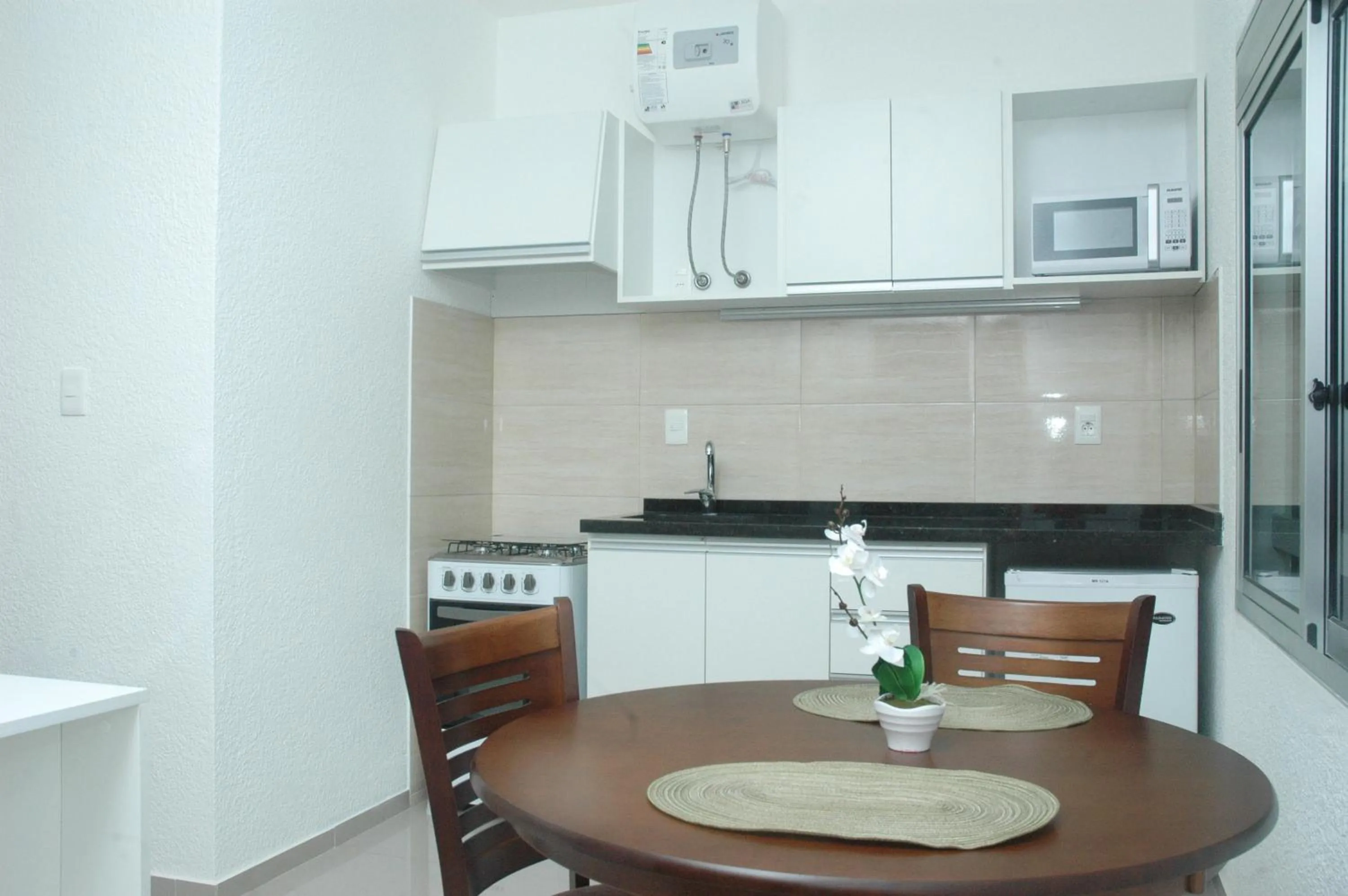 Kitchen or kitchenette in Paradise Complejo Turístico