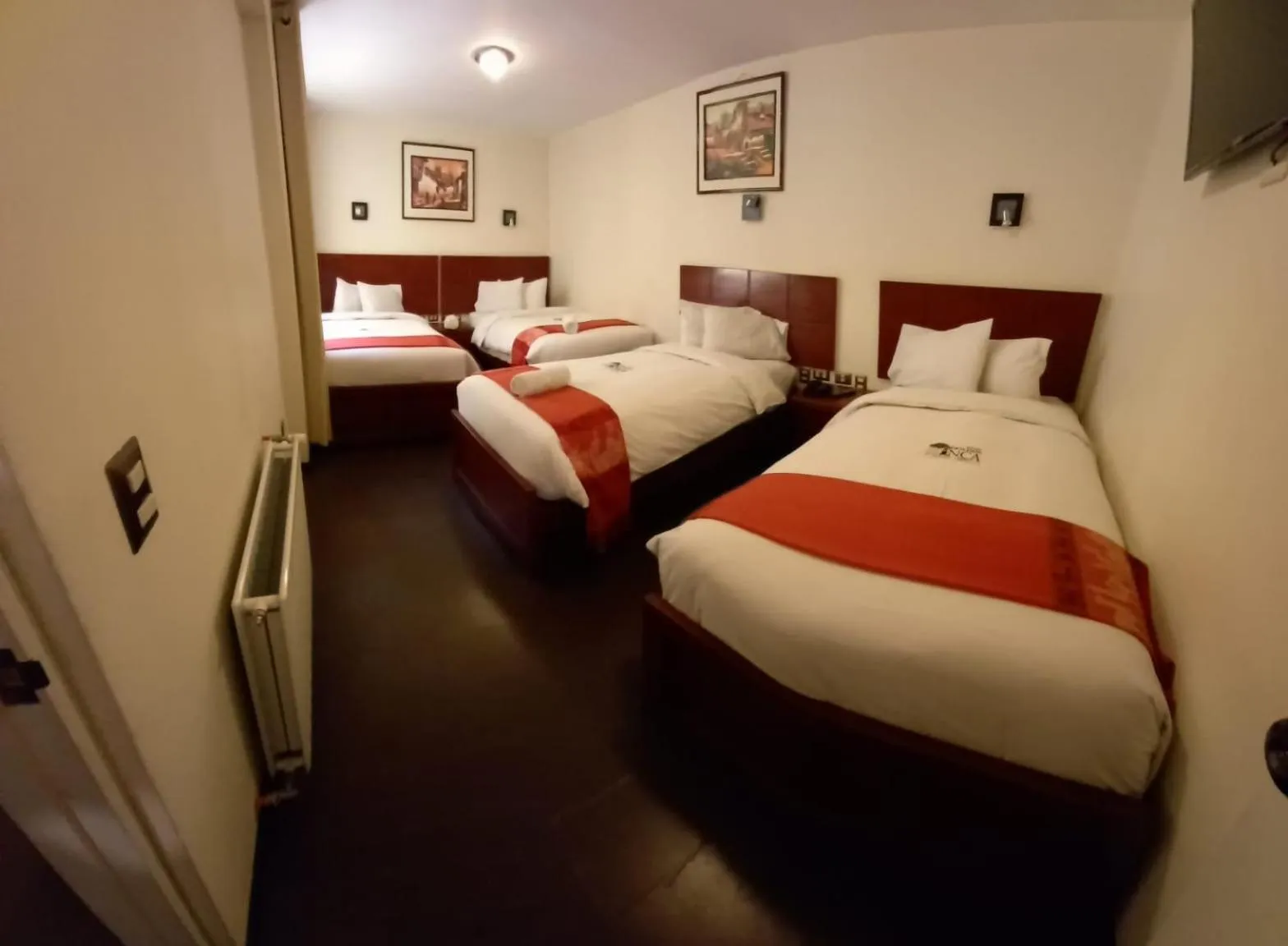 Bed in Golden Inca Hotel