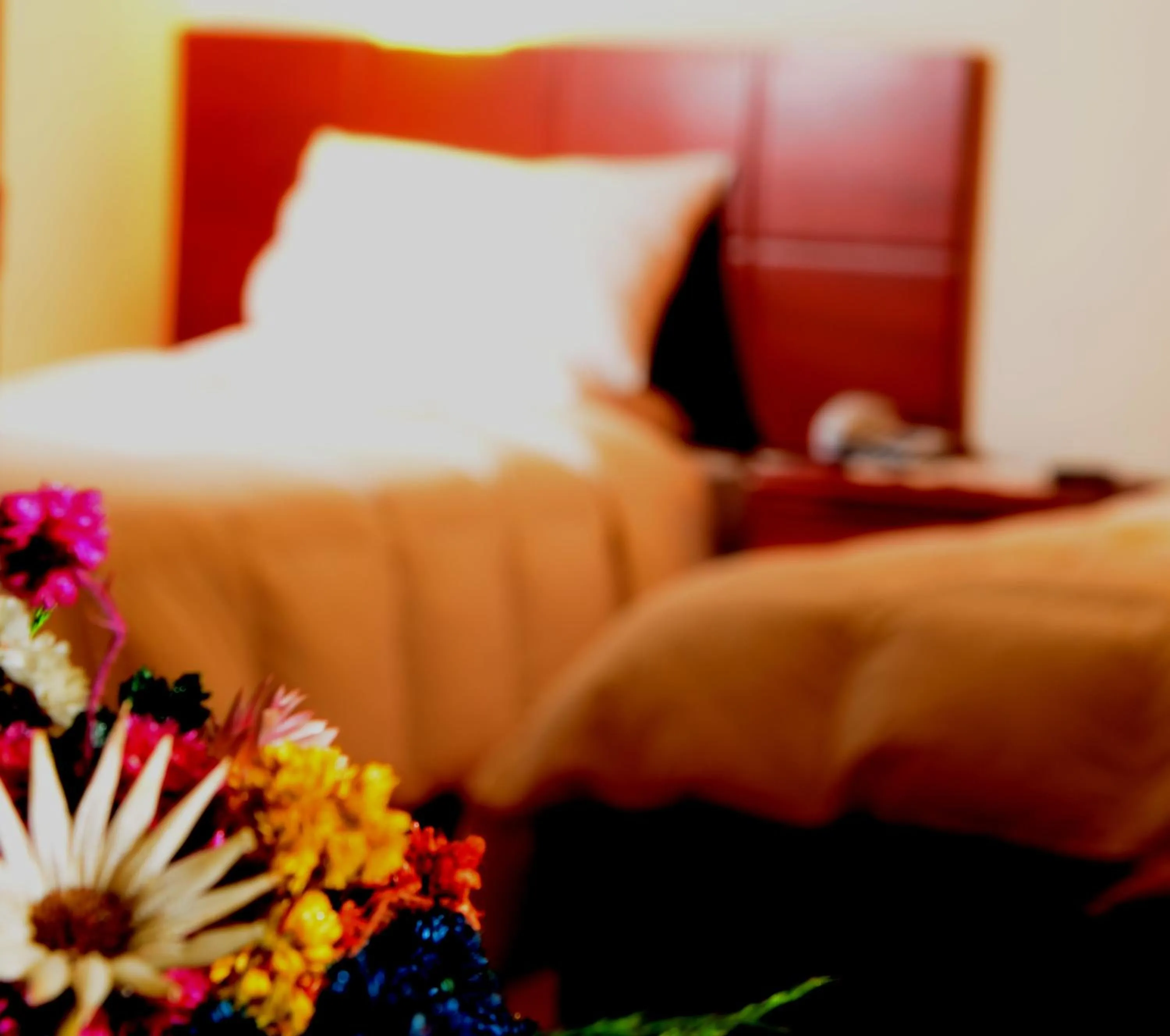 Bed in Golden Inca Hotel