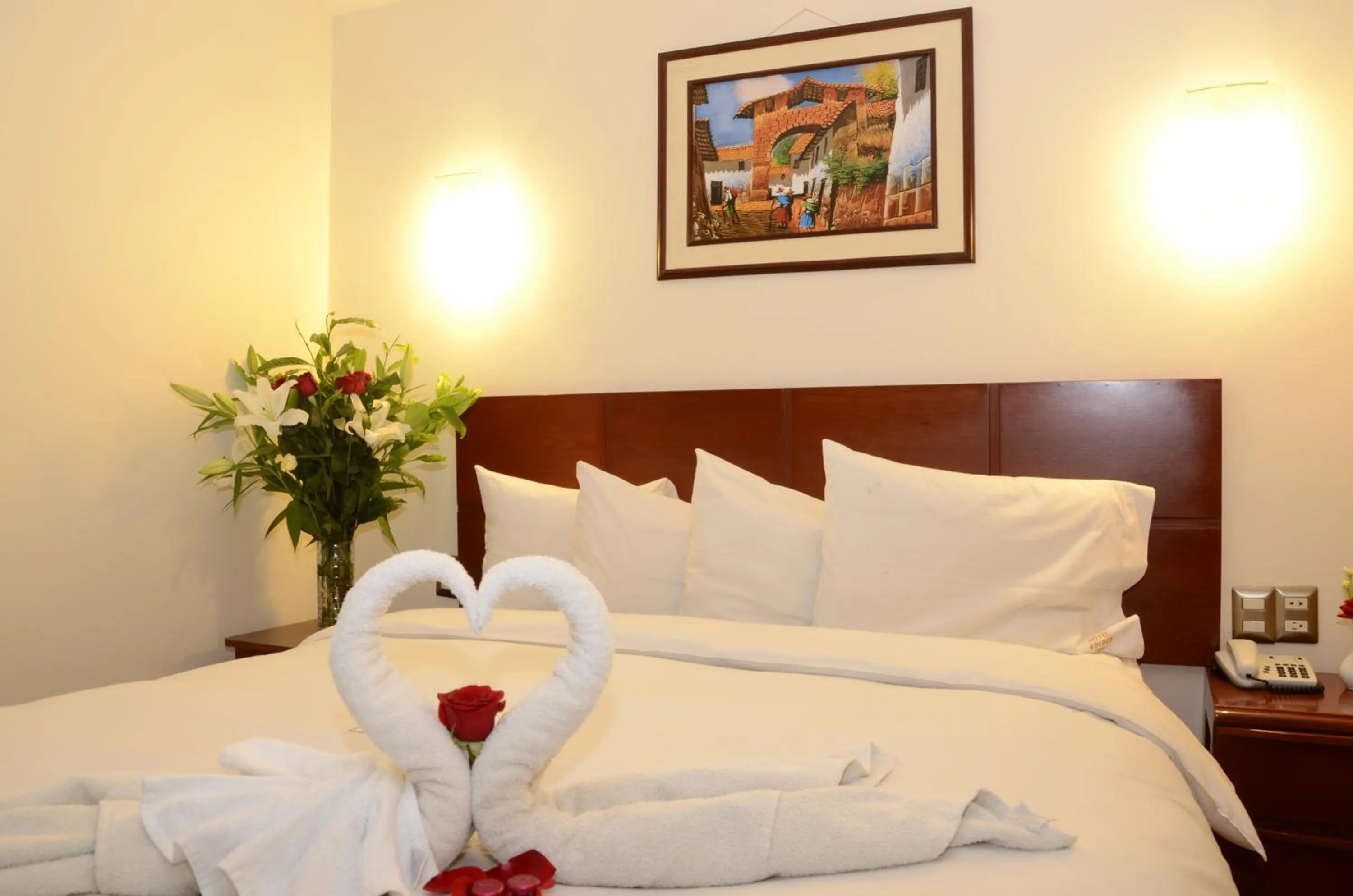 Bed in Golden Inca Hotel