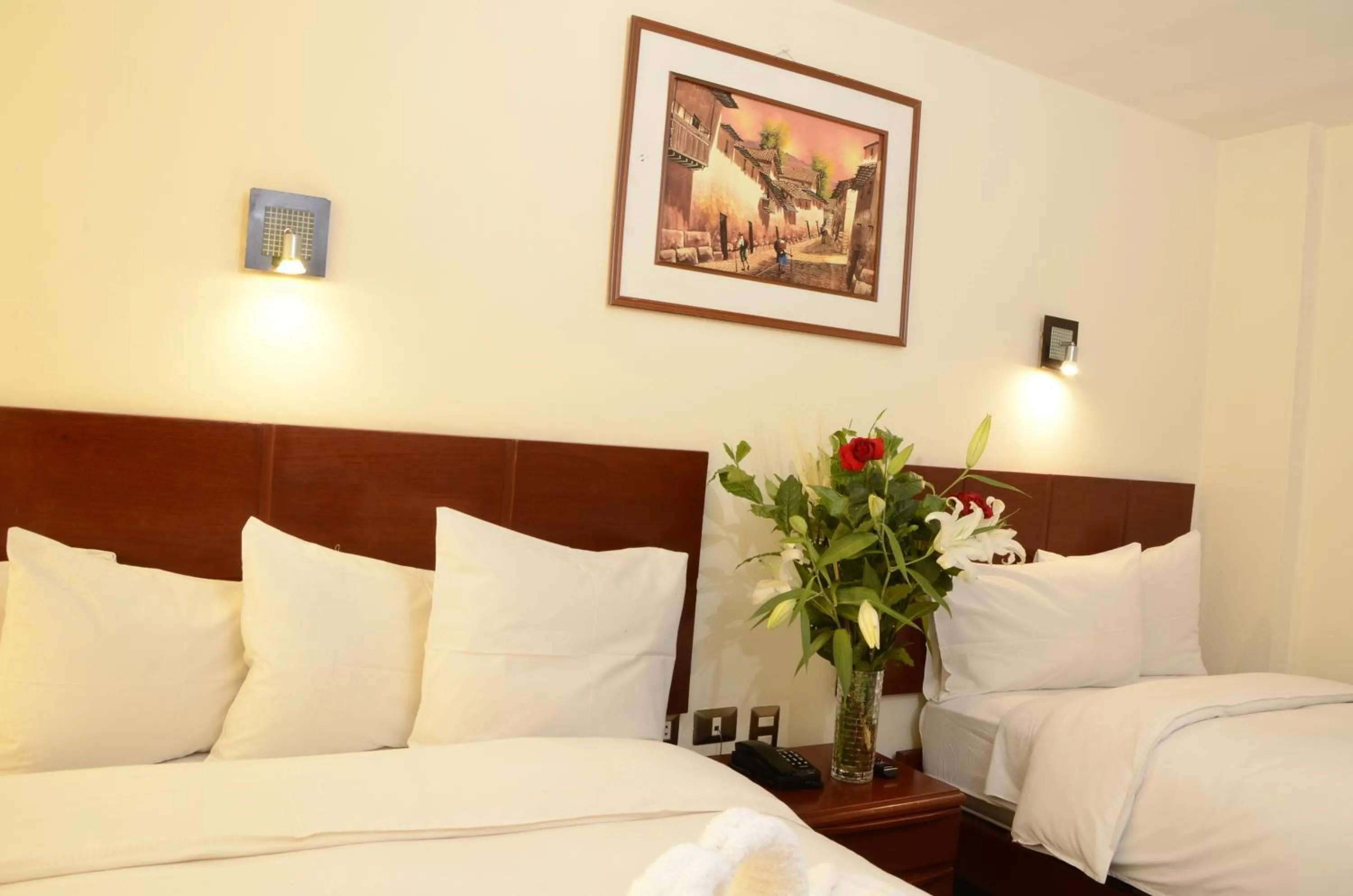 Bed in Golden Inca Hotel