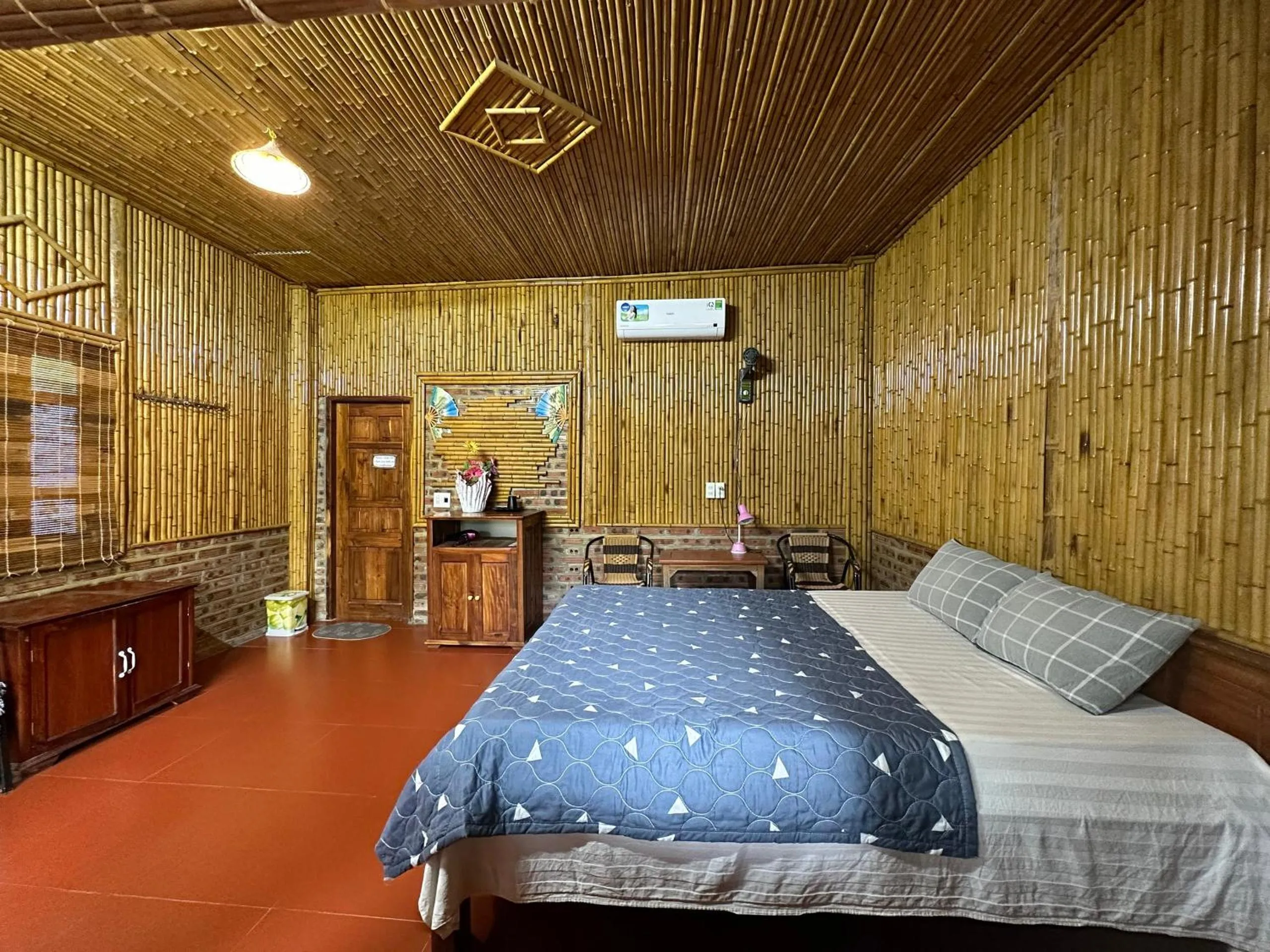 fireplace, Bed in Ninh Binh Bamboo Farmstay