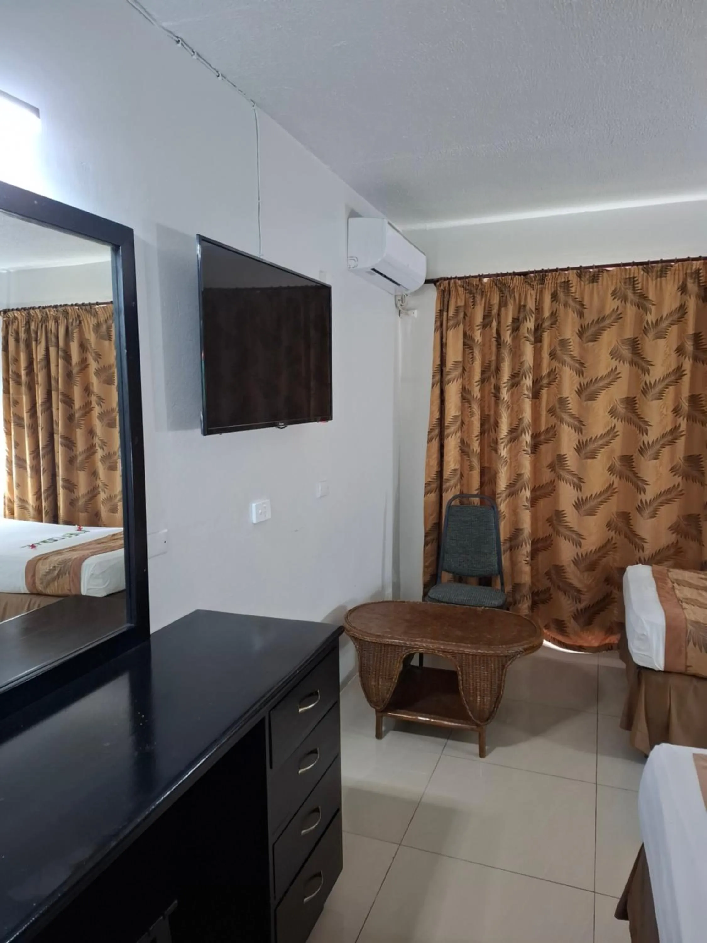 Bed in Capricorn International Hotel