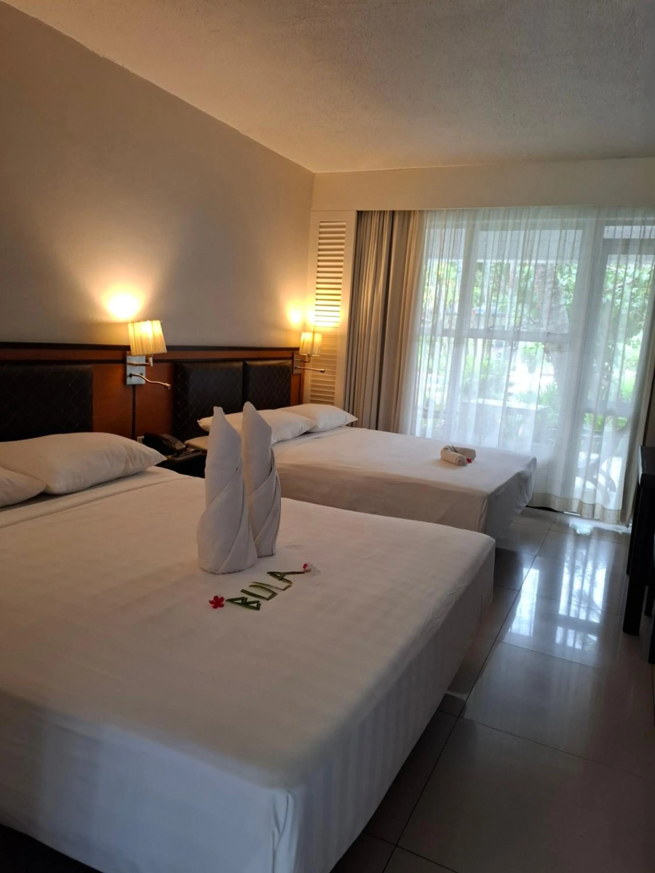 Bed in Capricorn International Hotel