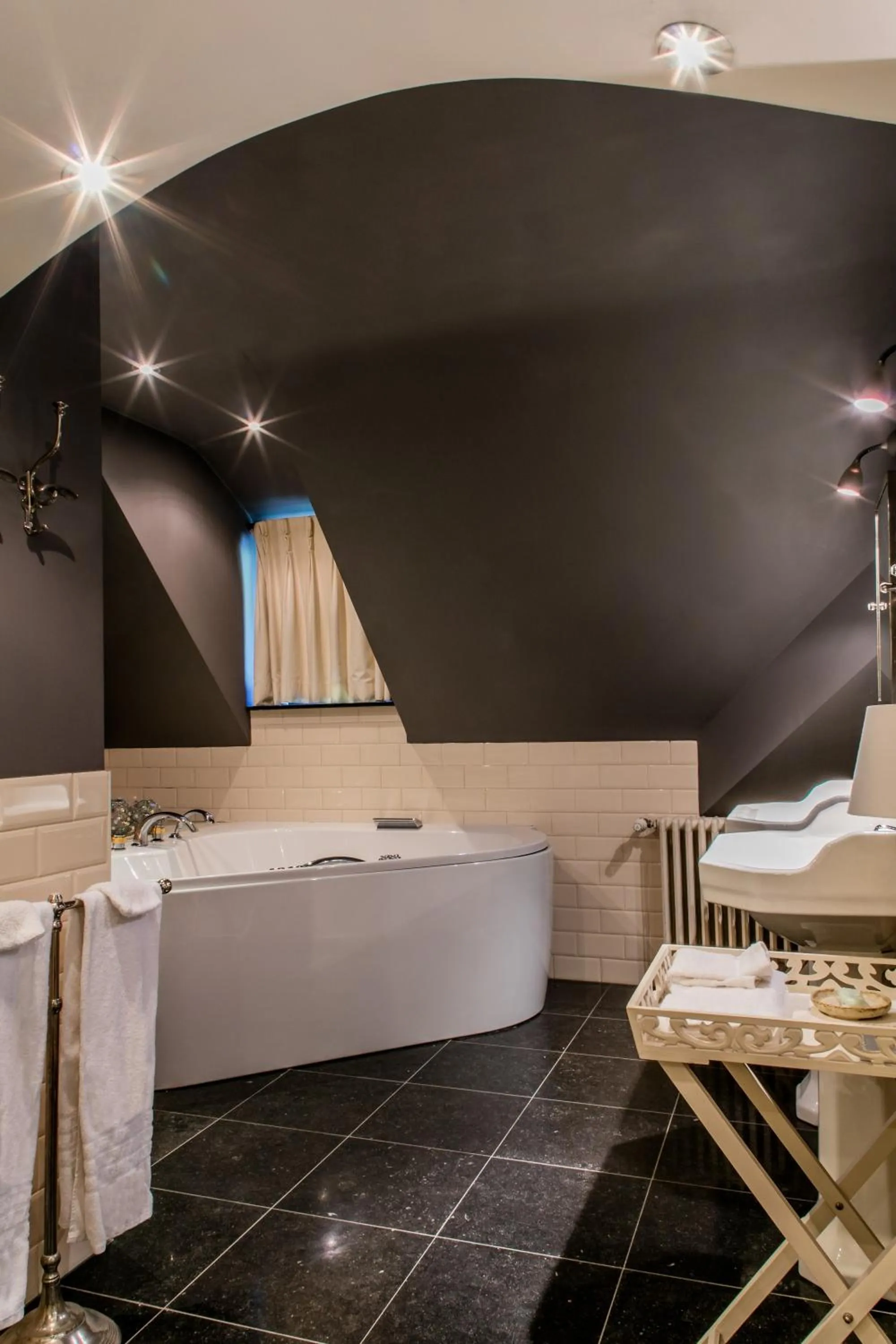 Bathroom in Charmehotel Manoir Ogygia