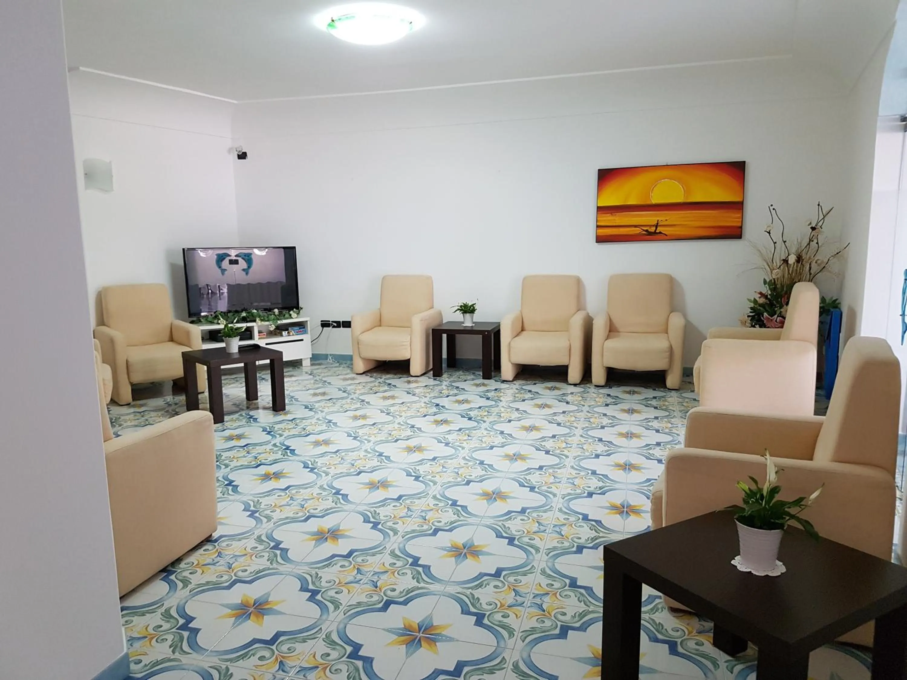 Communal lounge/ TV room in Hotel Da Maria
