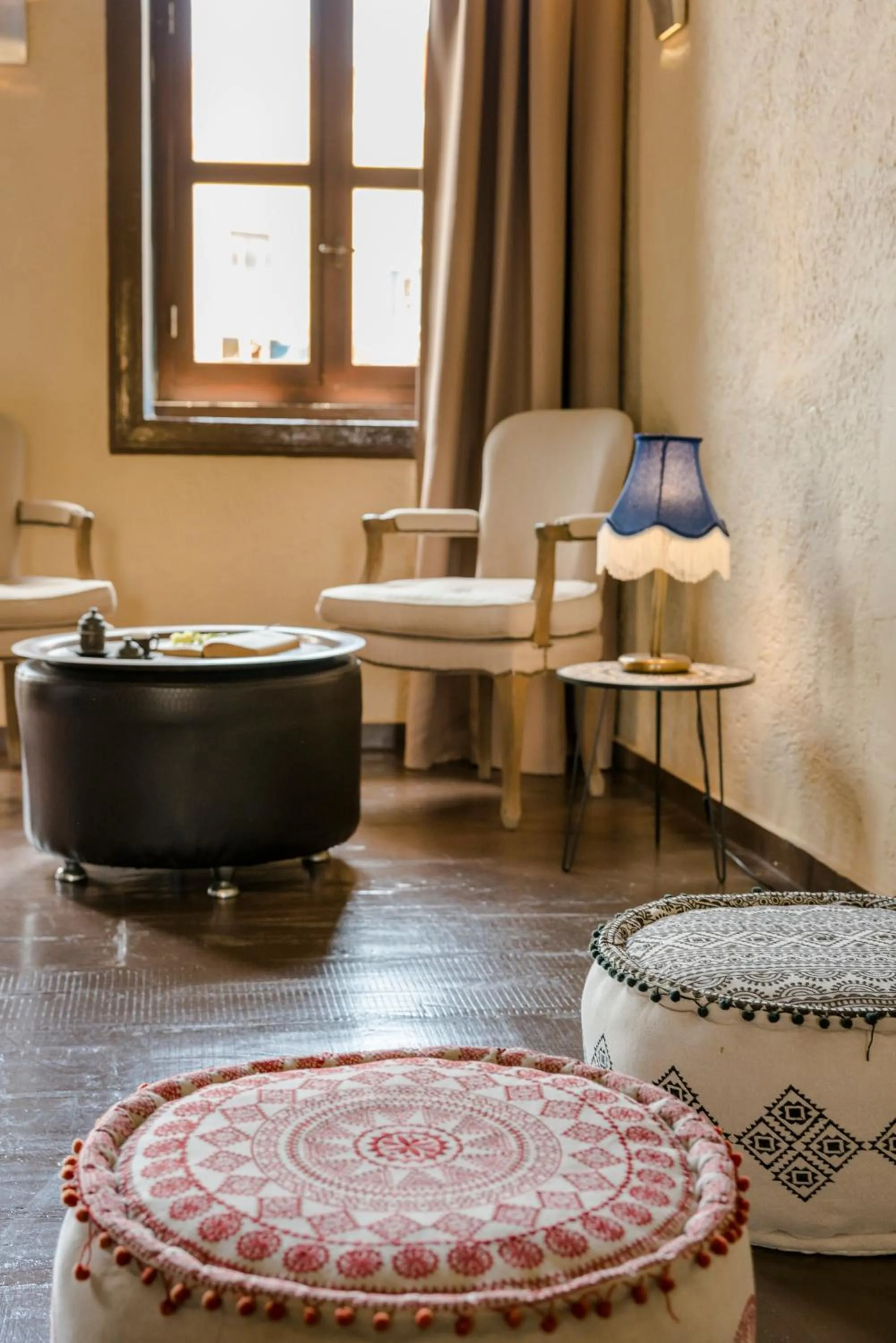 Seating area in Alcanea Boutique Hotel