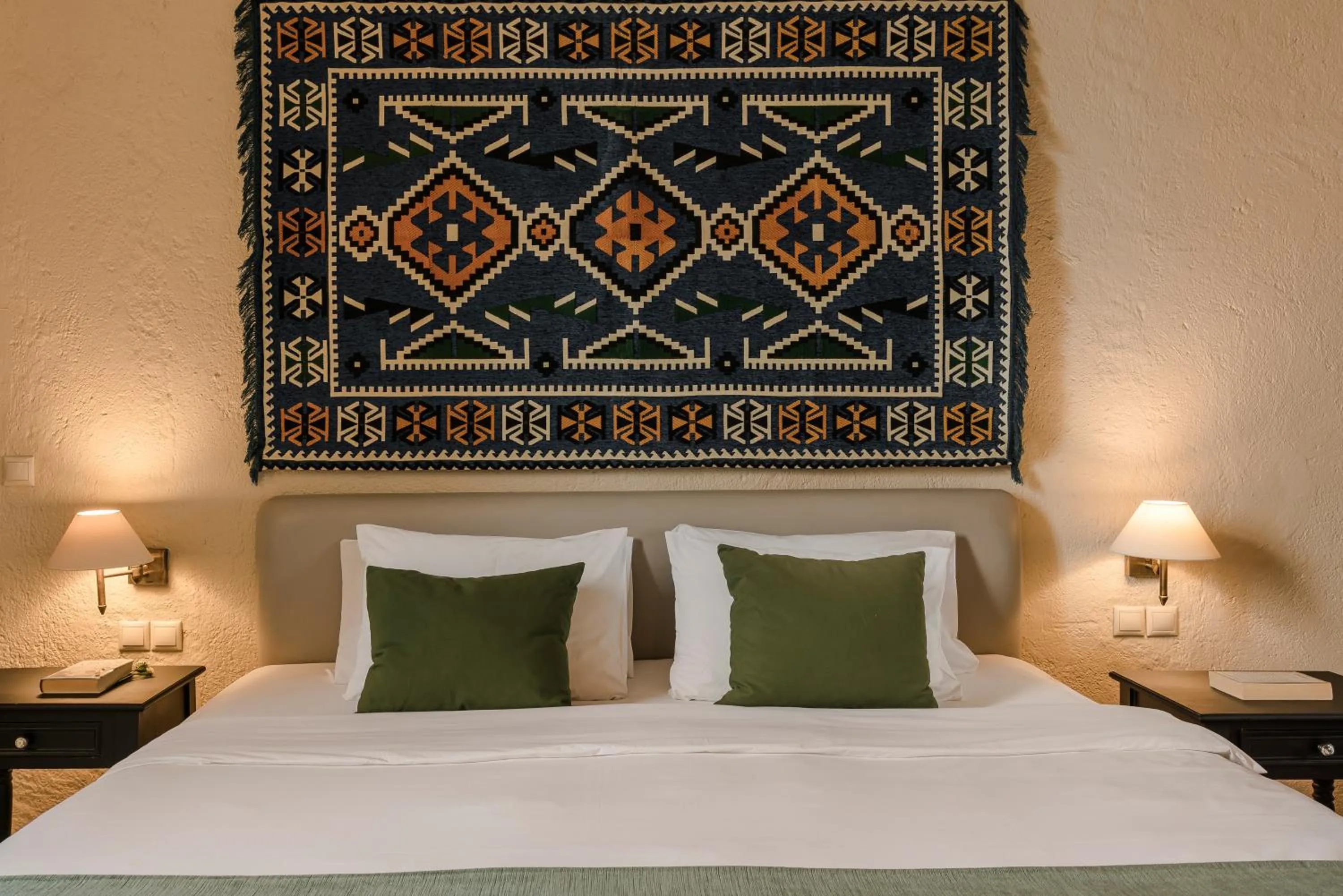 Bed in Alcanea Boutique Hotel