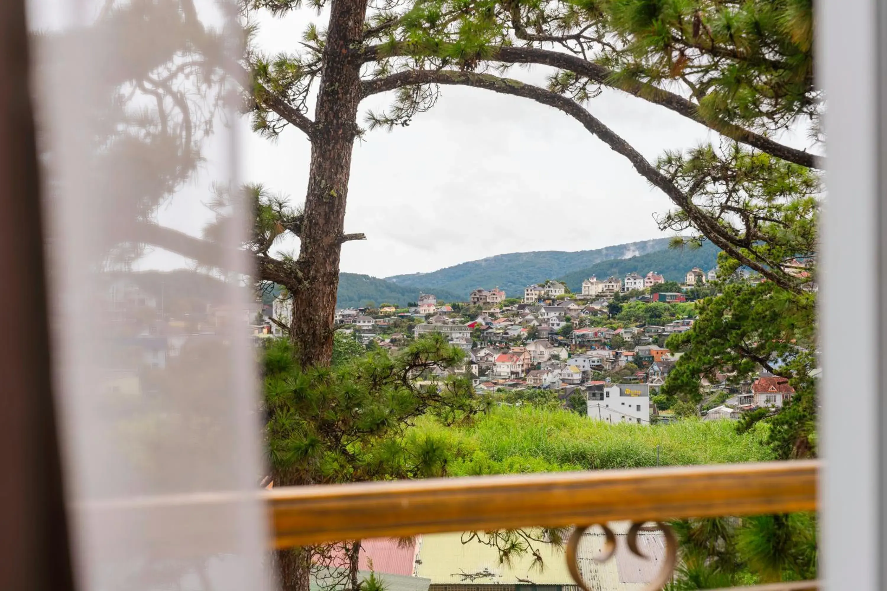 Triple Room with Balcony in NATURE Garden Hotel Dalat Triple Room with Balcony in NATURE Garden Hotel Dalat