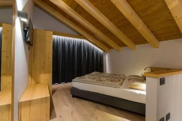 Bed in Arnica Mountain Hotel