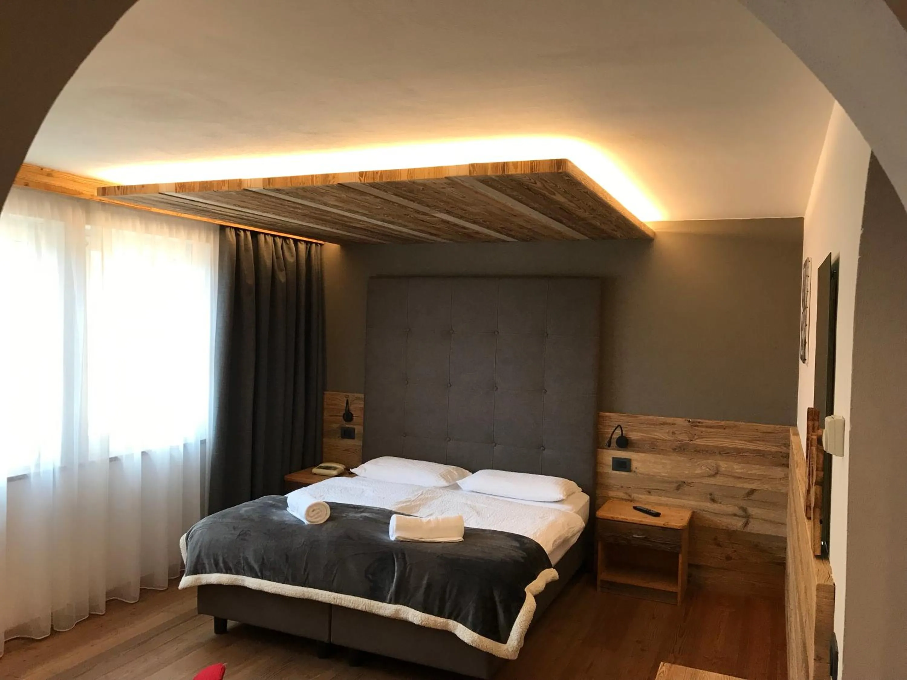 Bed in Arnica Mountain Hotel