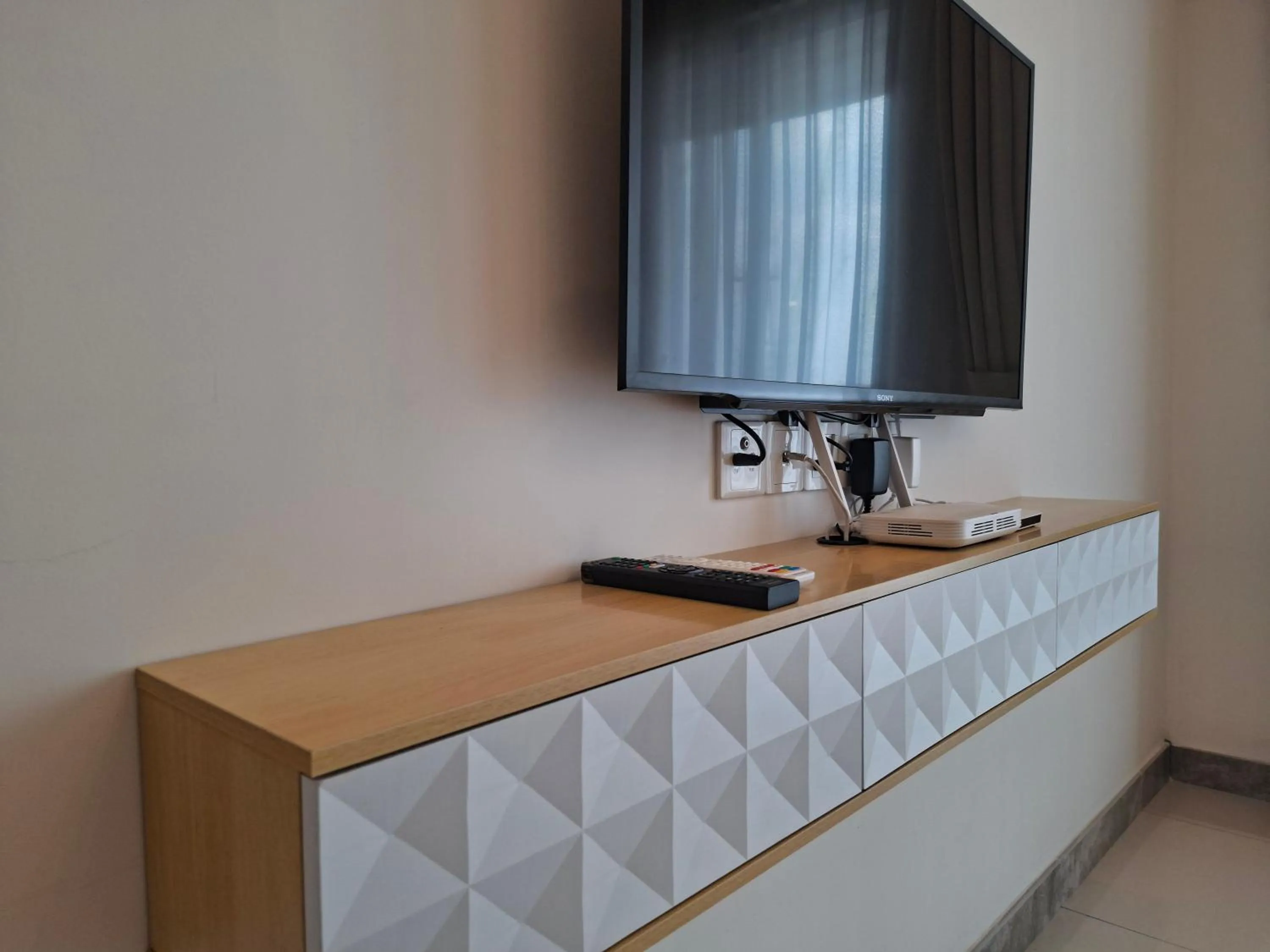 Living room in R&F Princess Cove JB By SaffronCasa JB