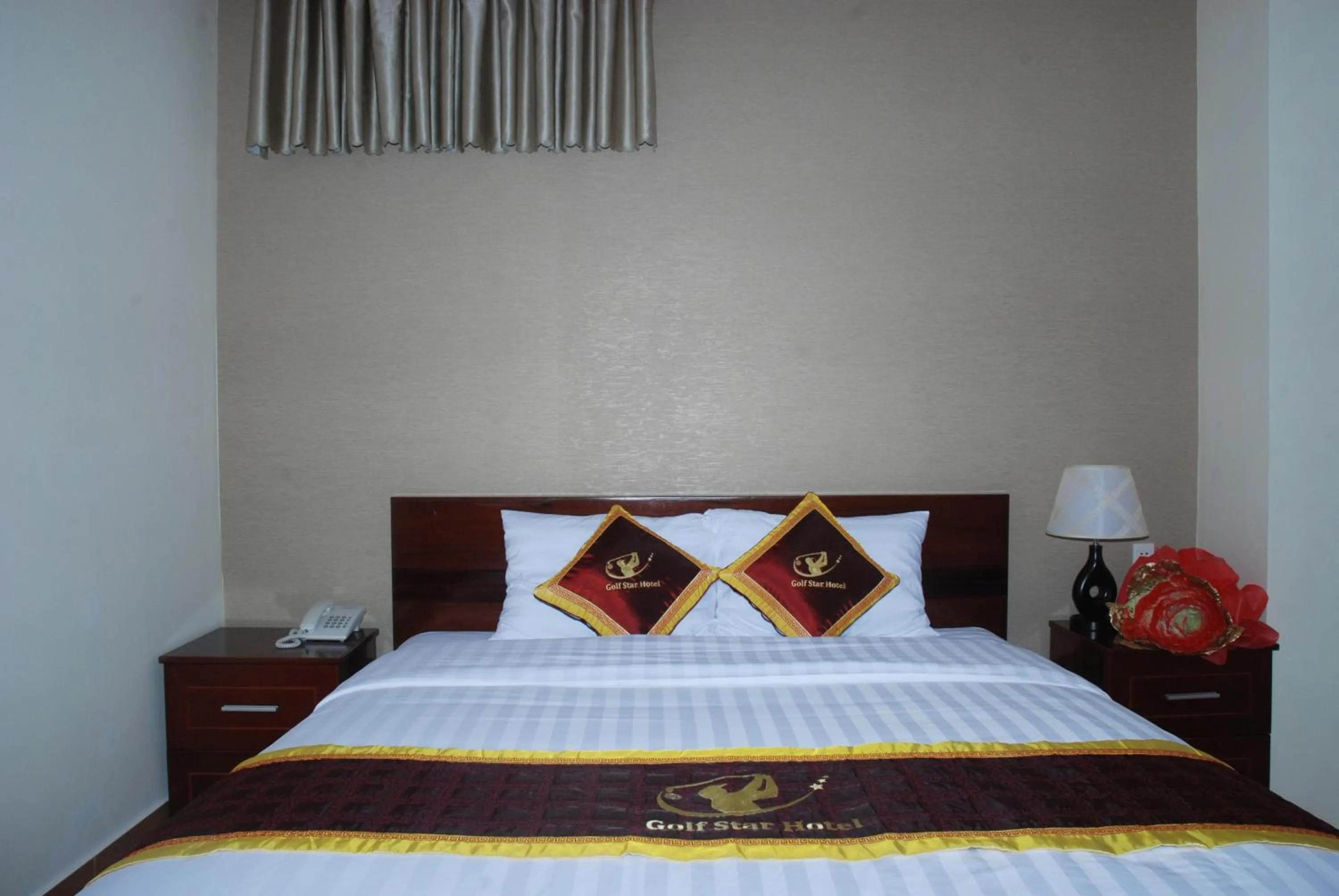 Bed in Golf Star Hotel