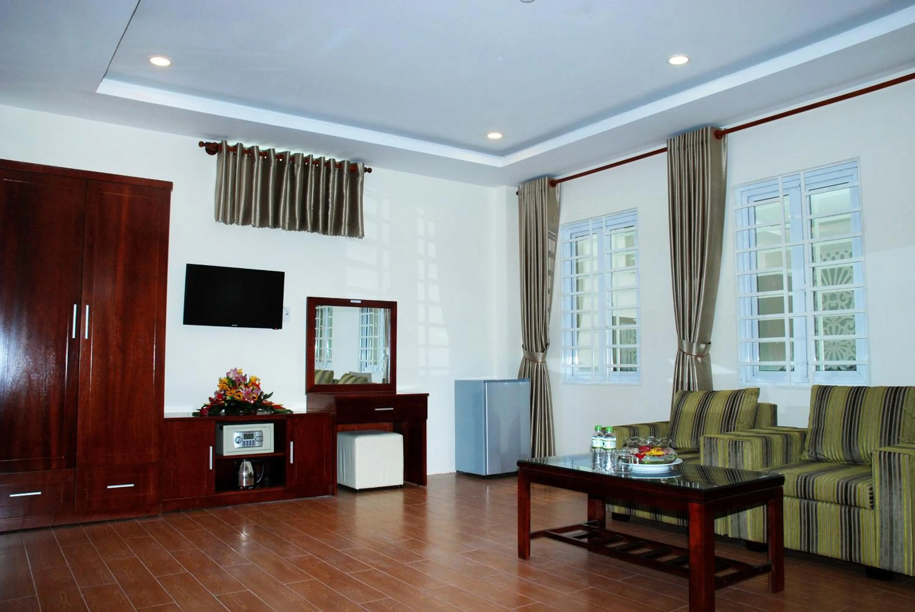 Communal lounge/ TV room in Golf Star Hotel