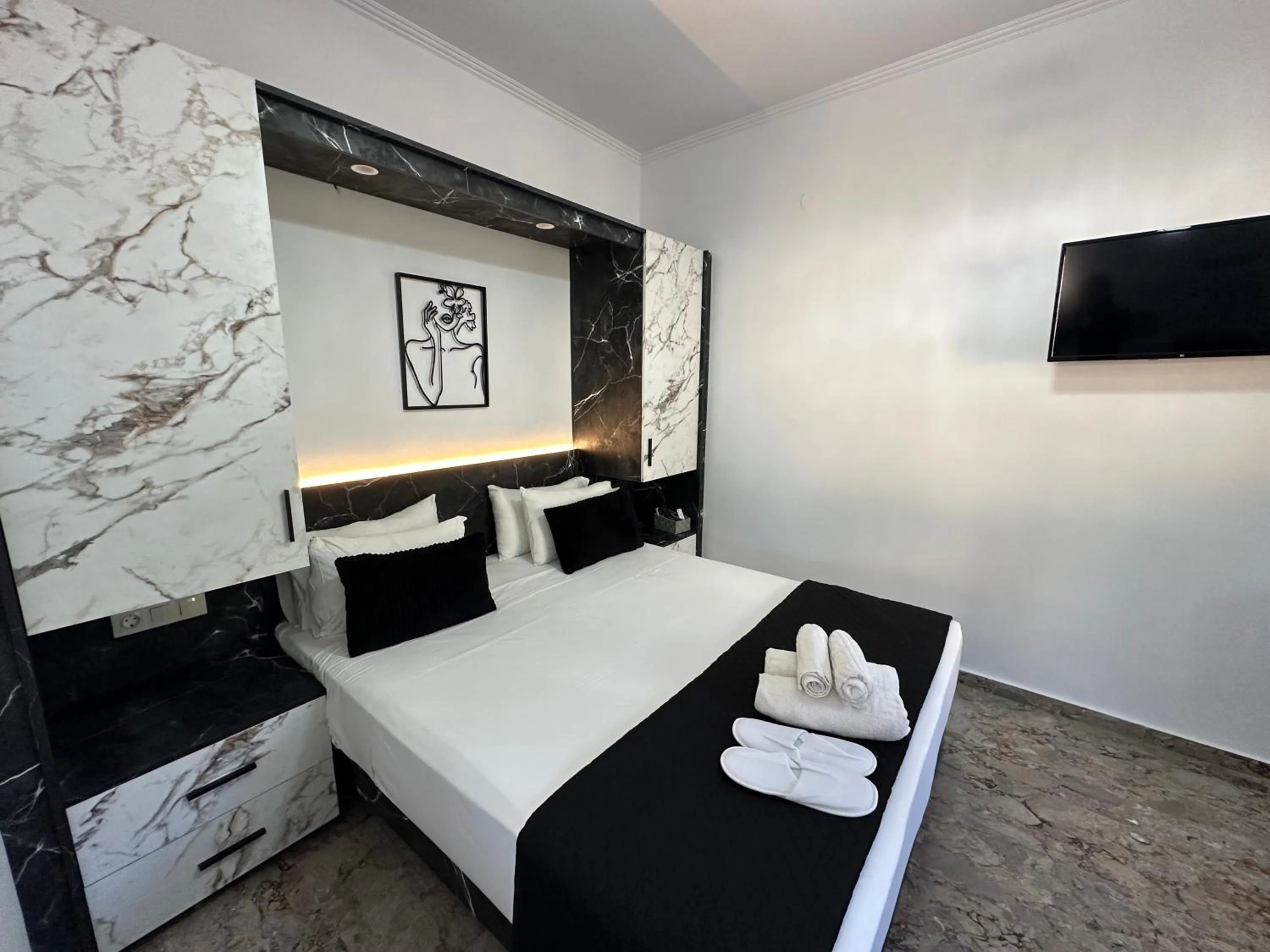 Bed in Nikos Apartments Corfu