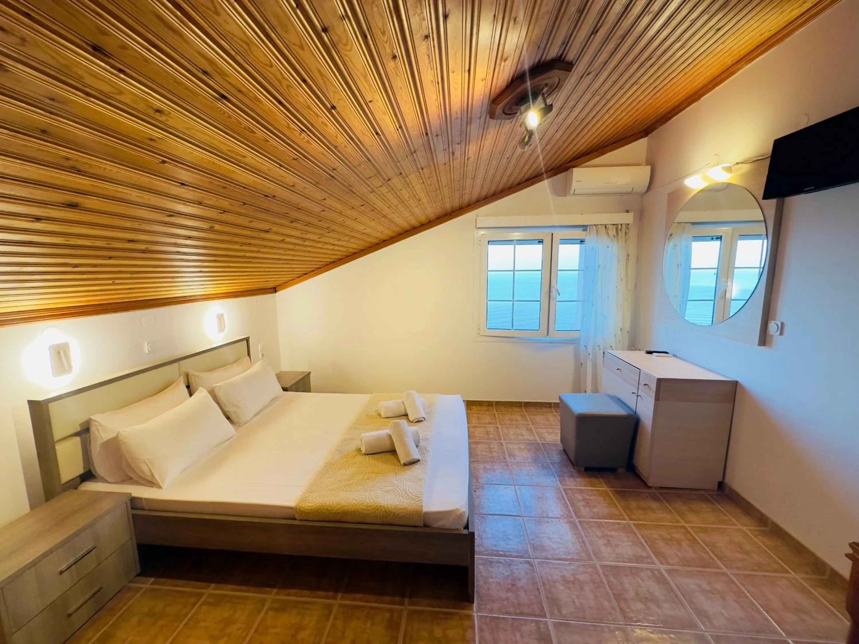 Bed in Nikos Apartments Corfu