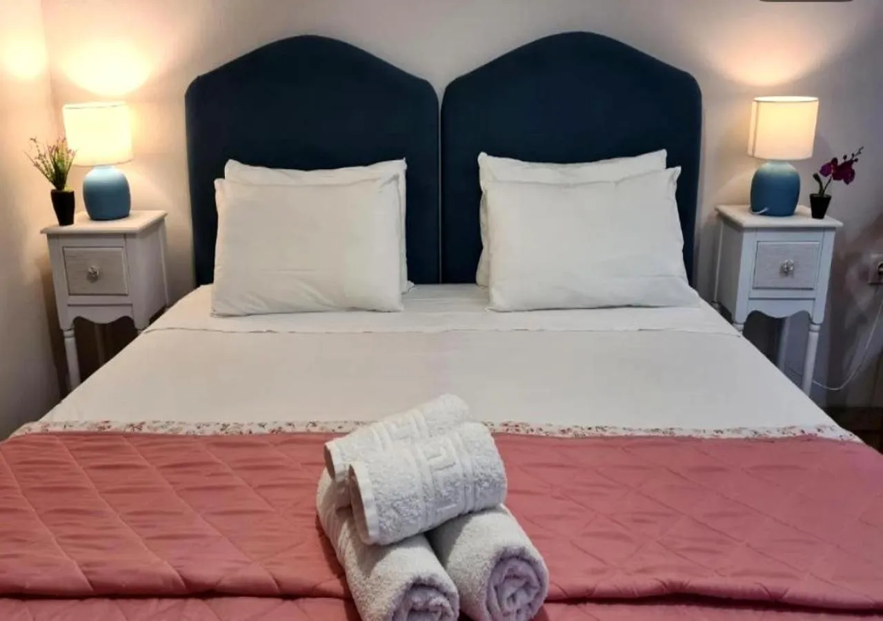 Bed in Nikos Apartments Corfu