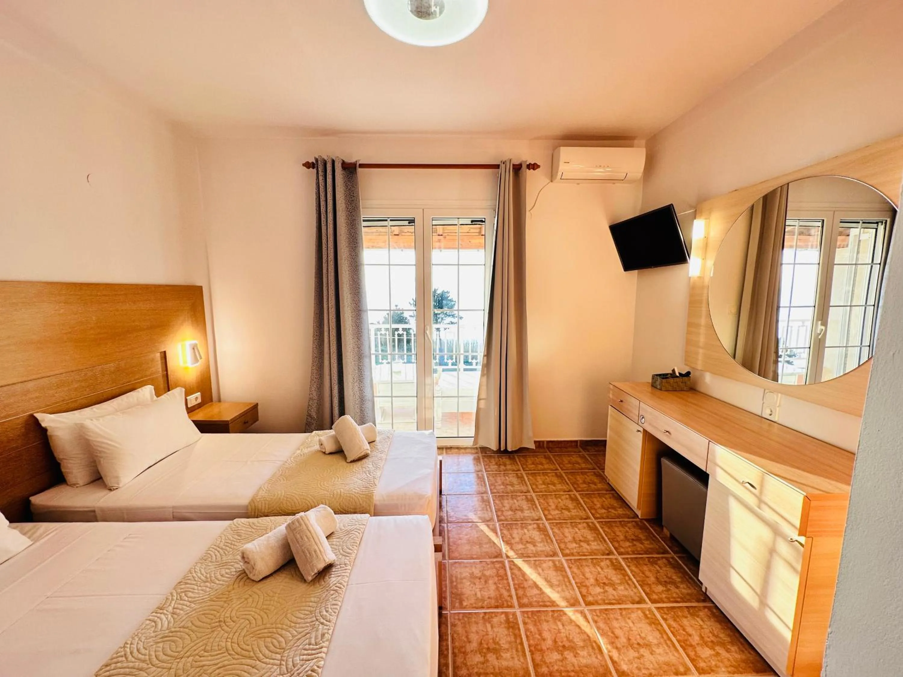 Bed in Nikos Apartments Corfu