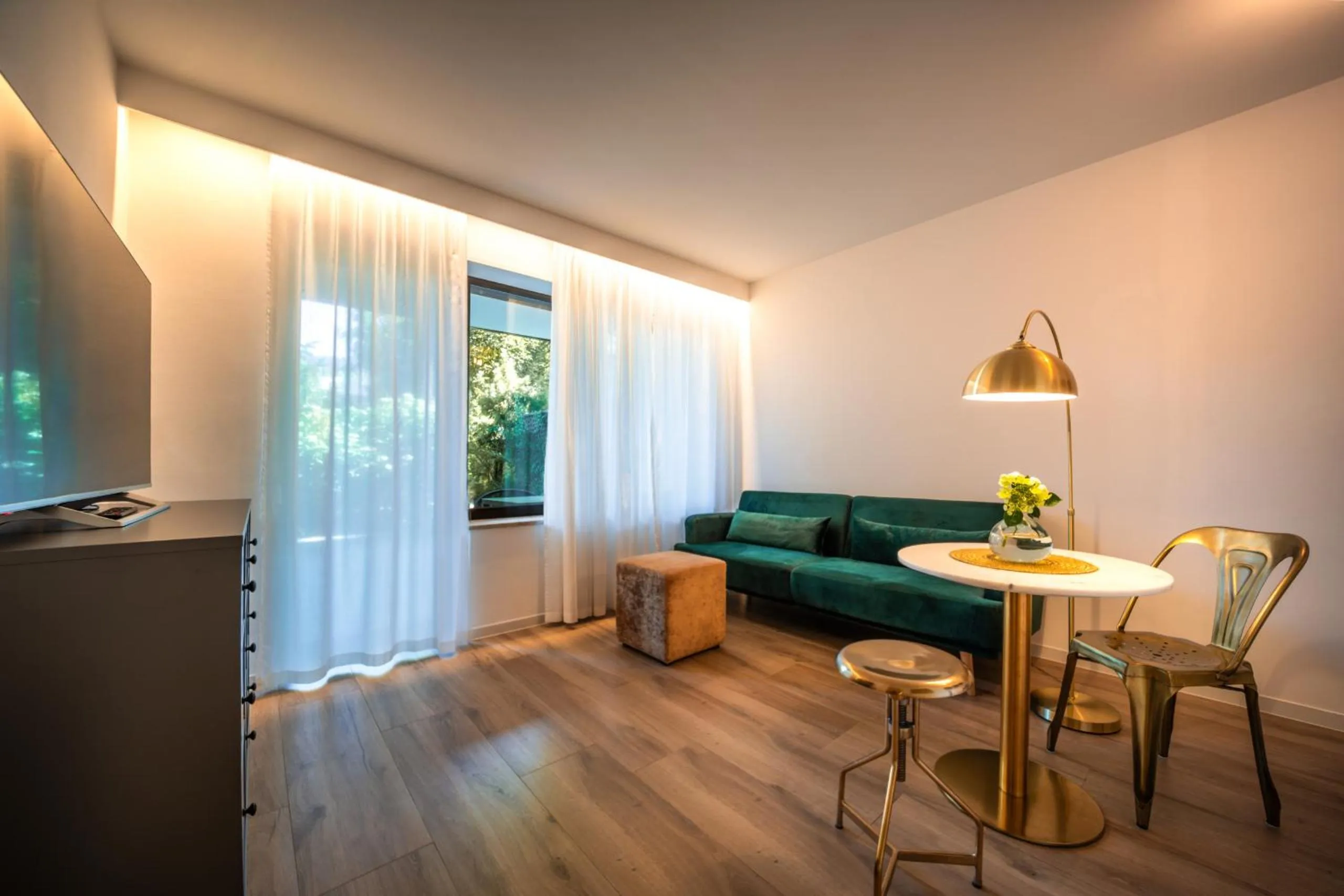 Living room in goldfinger + suites