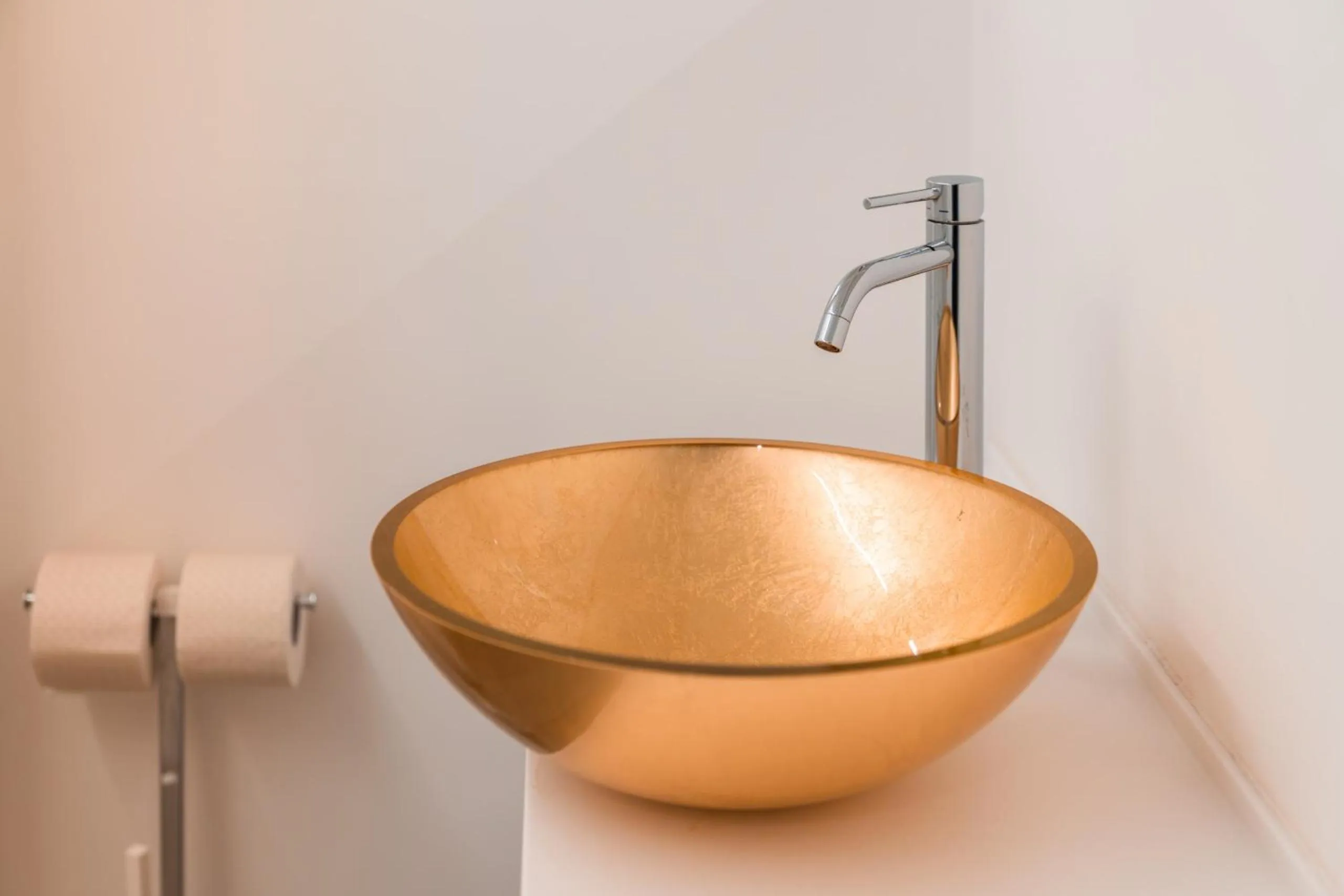 Bathroom in goldfinger + suites