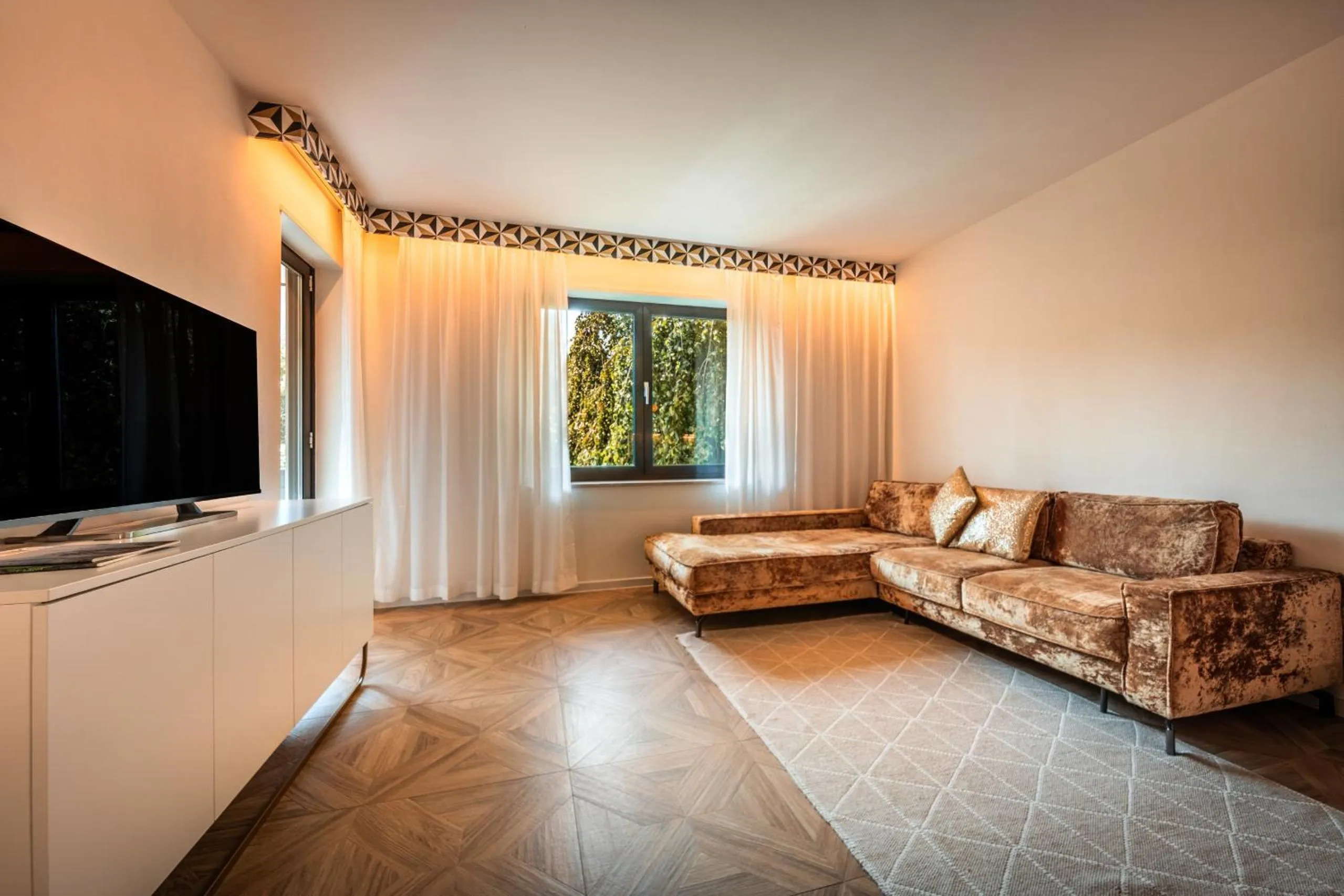 Living room in goldfinger + suites