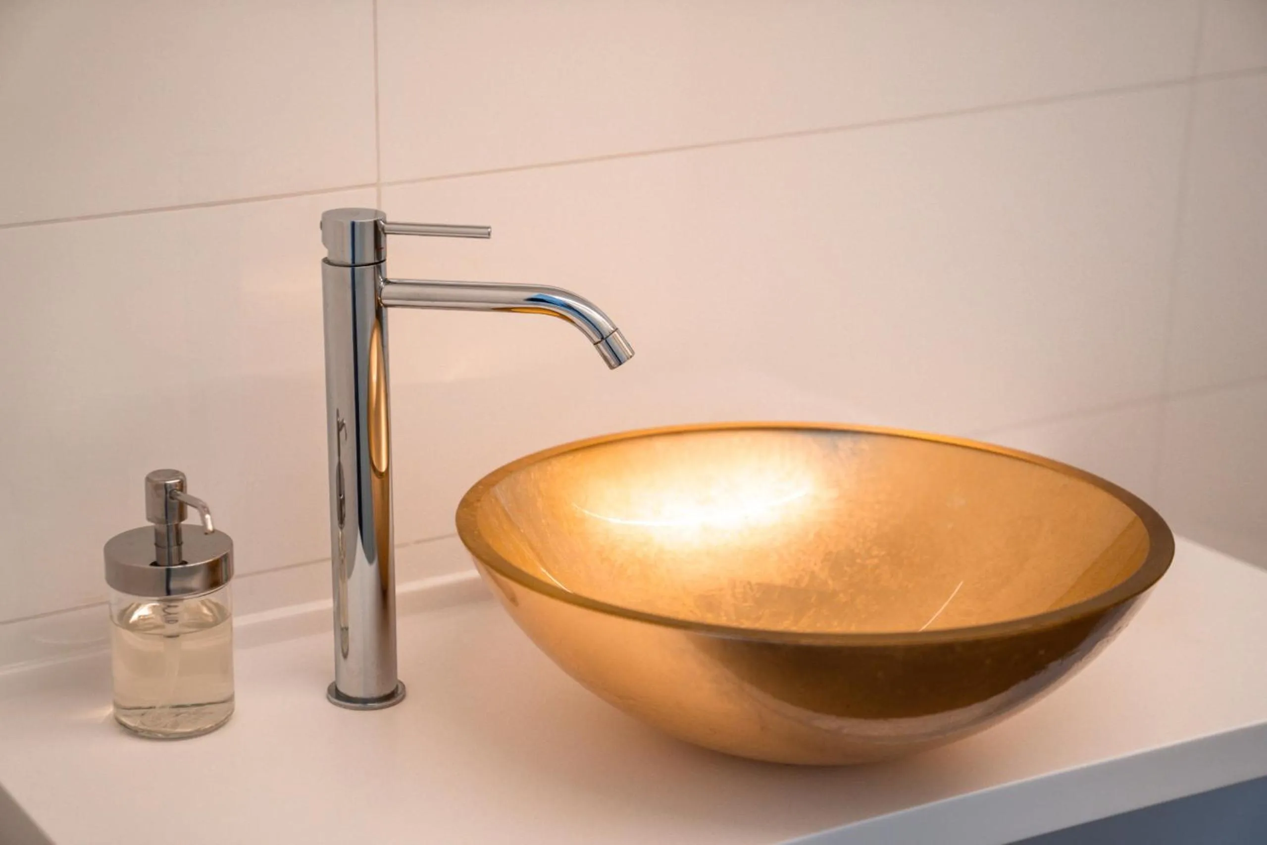 Bathroom in goldfinger + suites