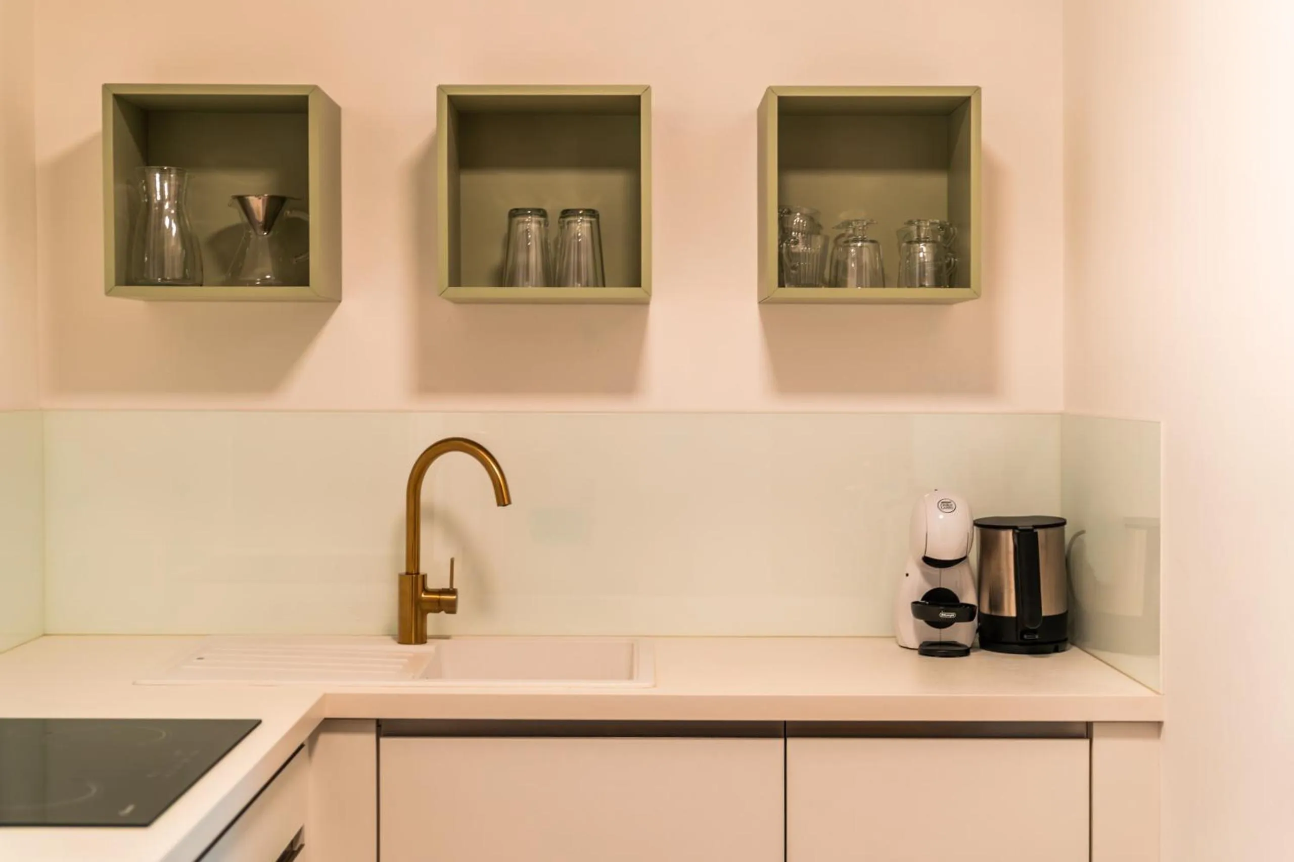 Kitchen or kitchenette in goldfinger + suites