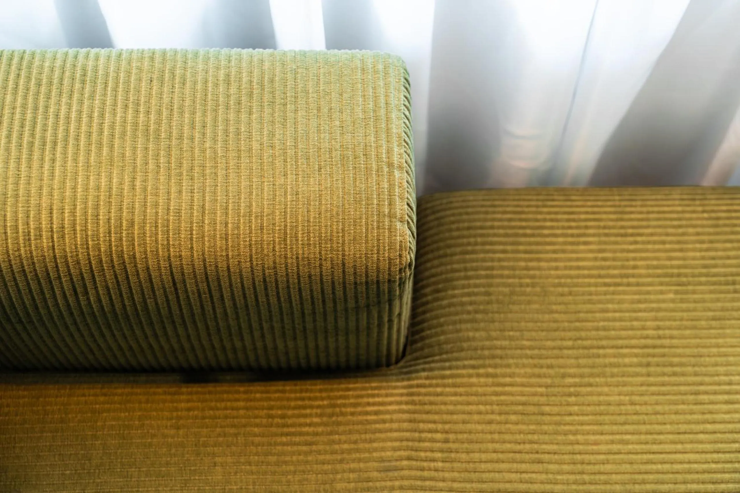 Seating area in goldfinger + suites