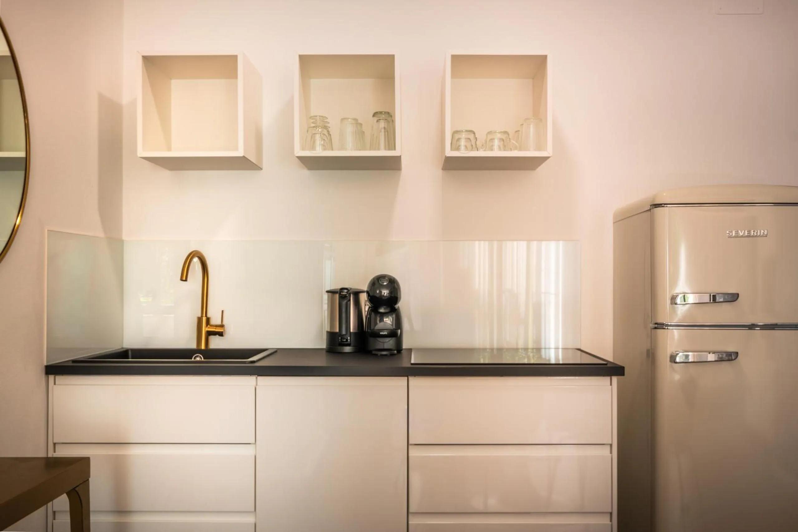 Kitchen or kitchenette in goldfinger + suites