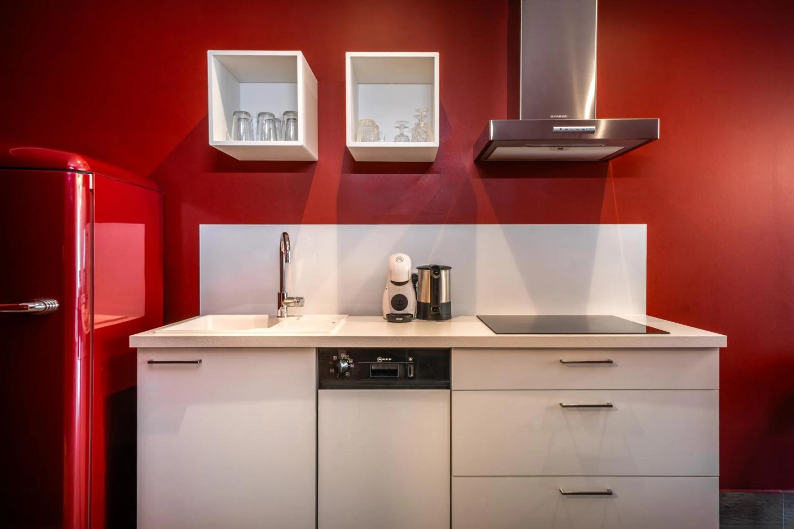 Kitchen or kitchenette in goldfinger + suites