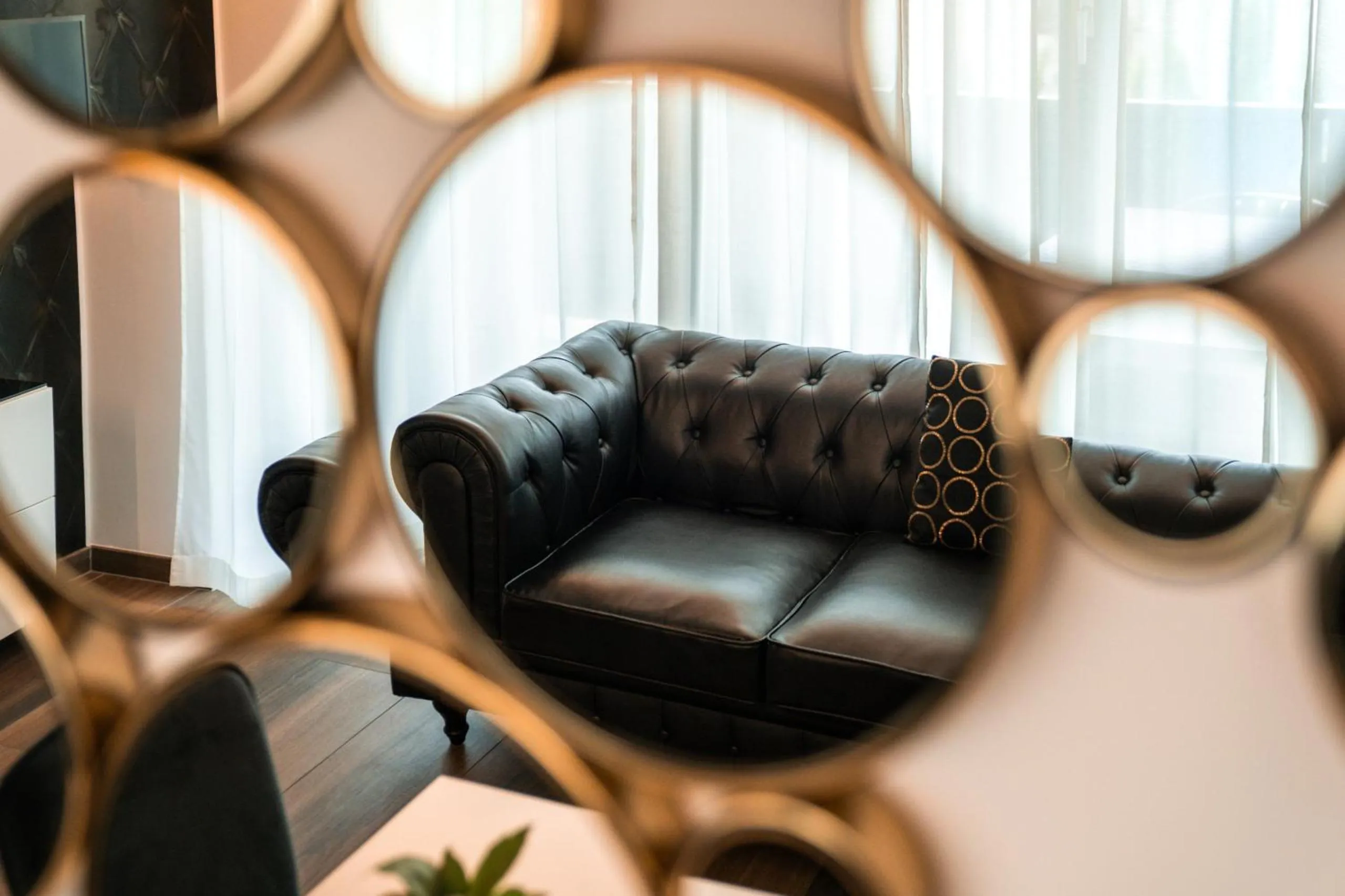 Living room in goldfinger + suites