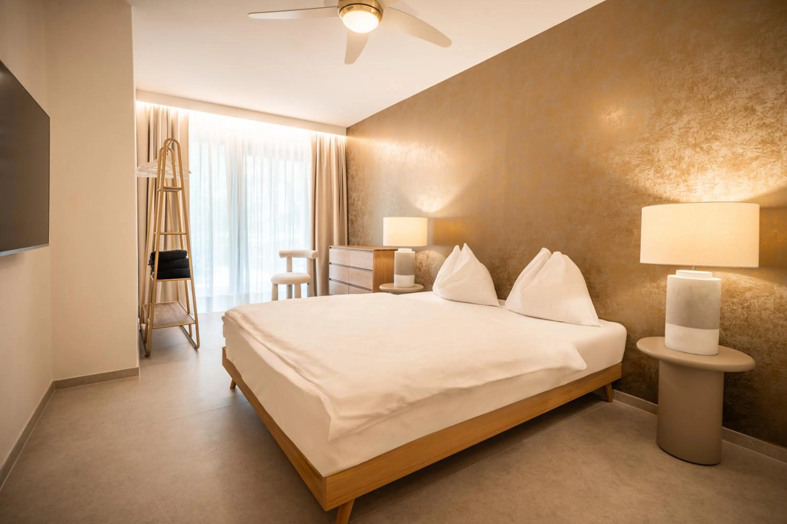 Bedroom, Bed in goldfinger + suites