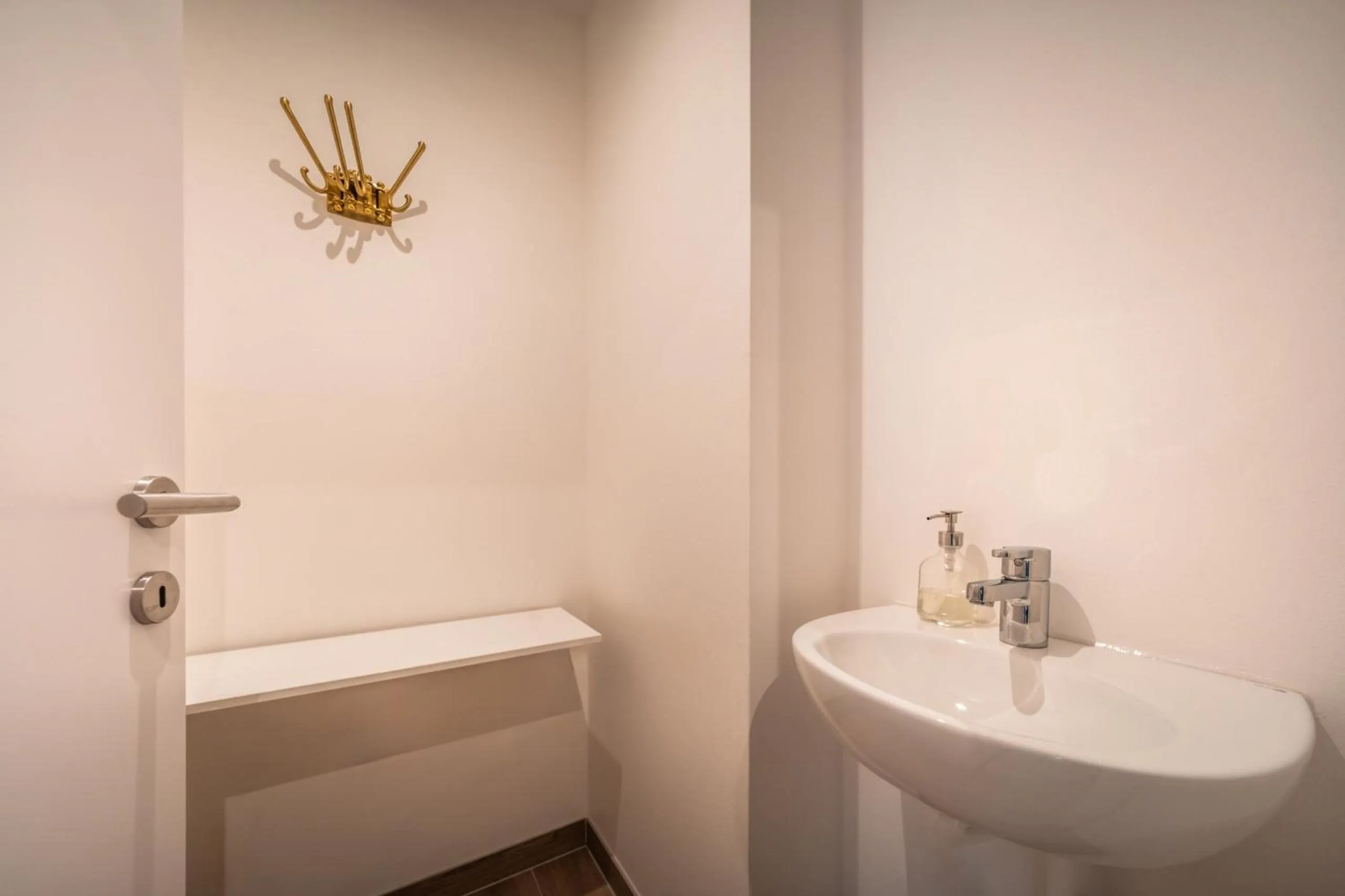 Bathroom in goldfinger + suites