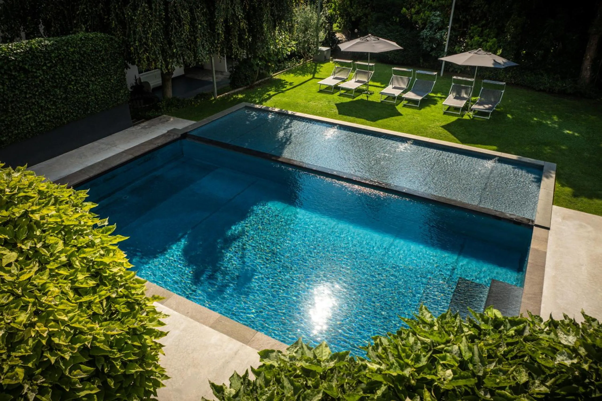 Swimming pool in goldfinger + suites