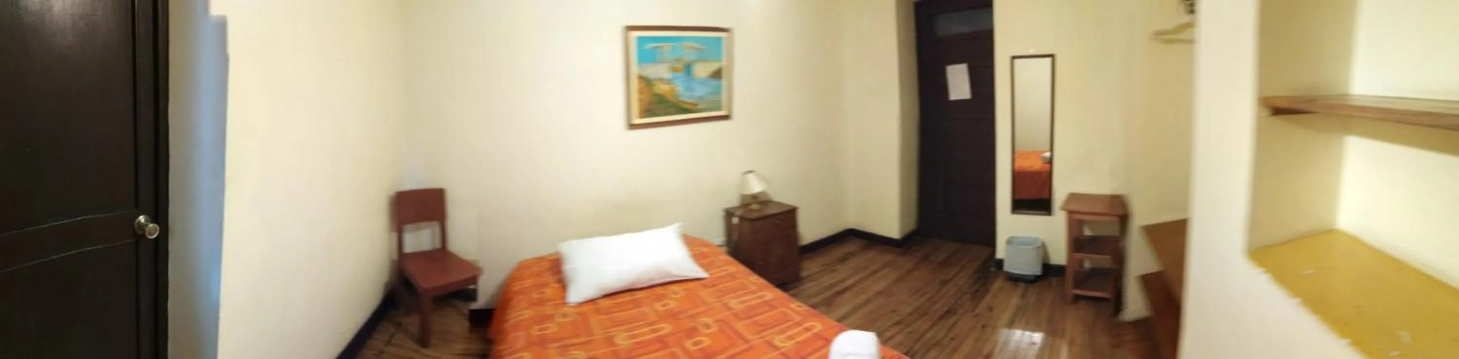 Bed in El Tuco Hotel