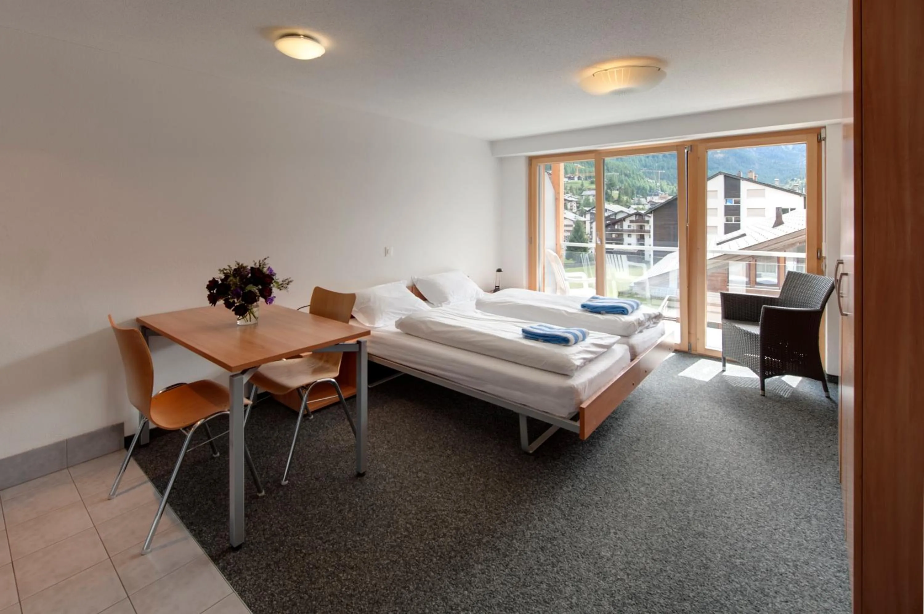 Photo of the whole room, Bed in Good Value Apartments by MX Zermatt