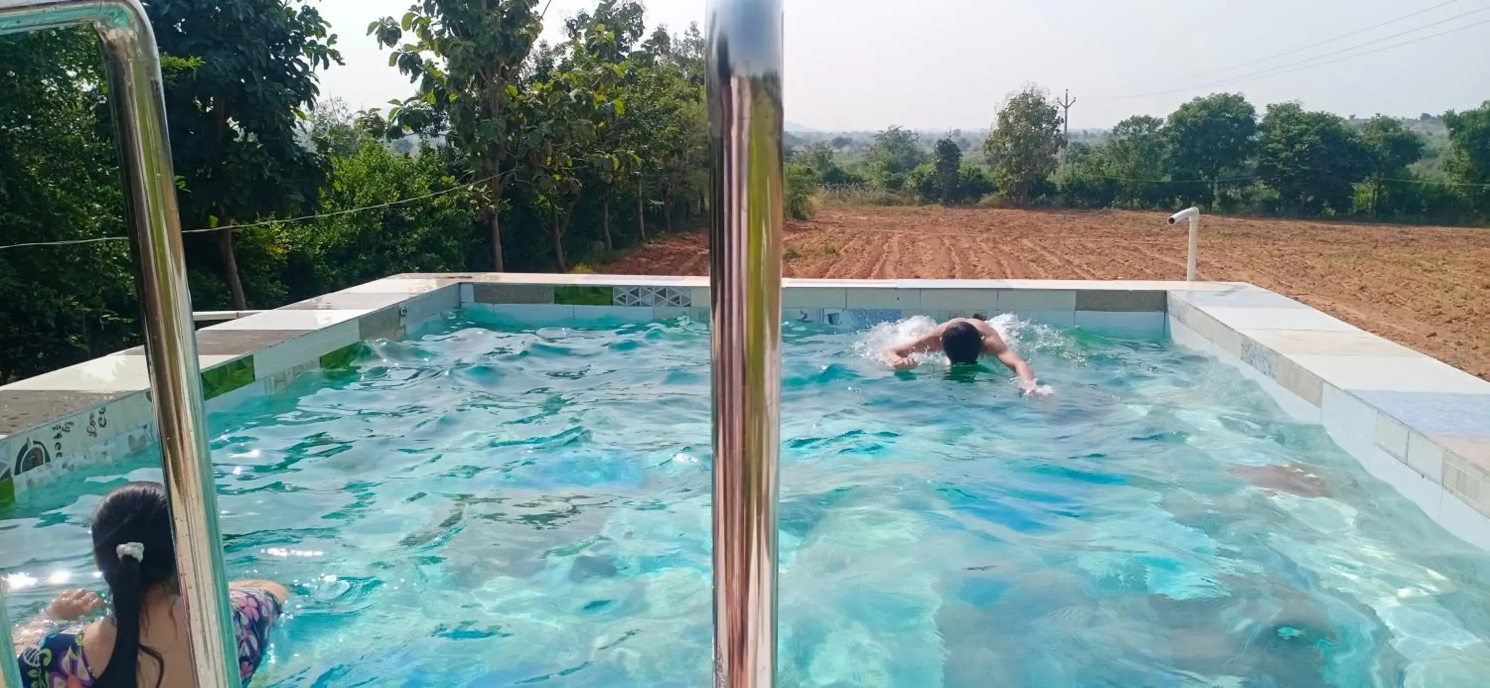 Swimming pool in An Authentic Village Farm Swimming pool in An Authentic Village Farm