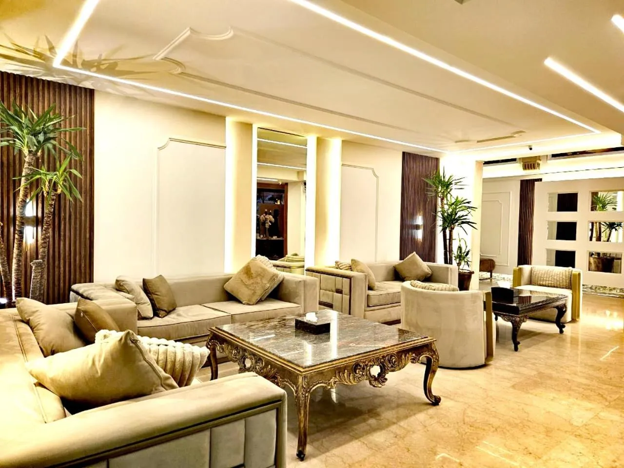 Lobby or reception in Queens Suite Hotel