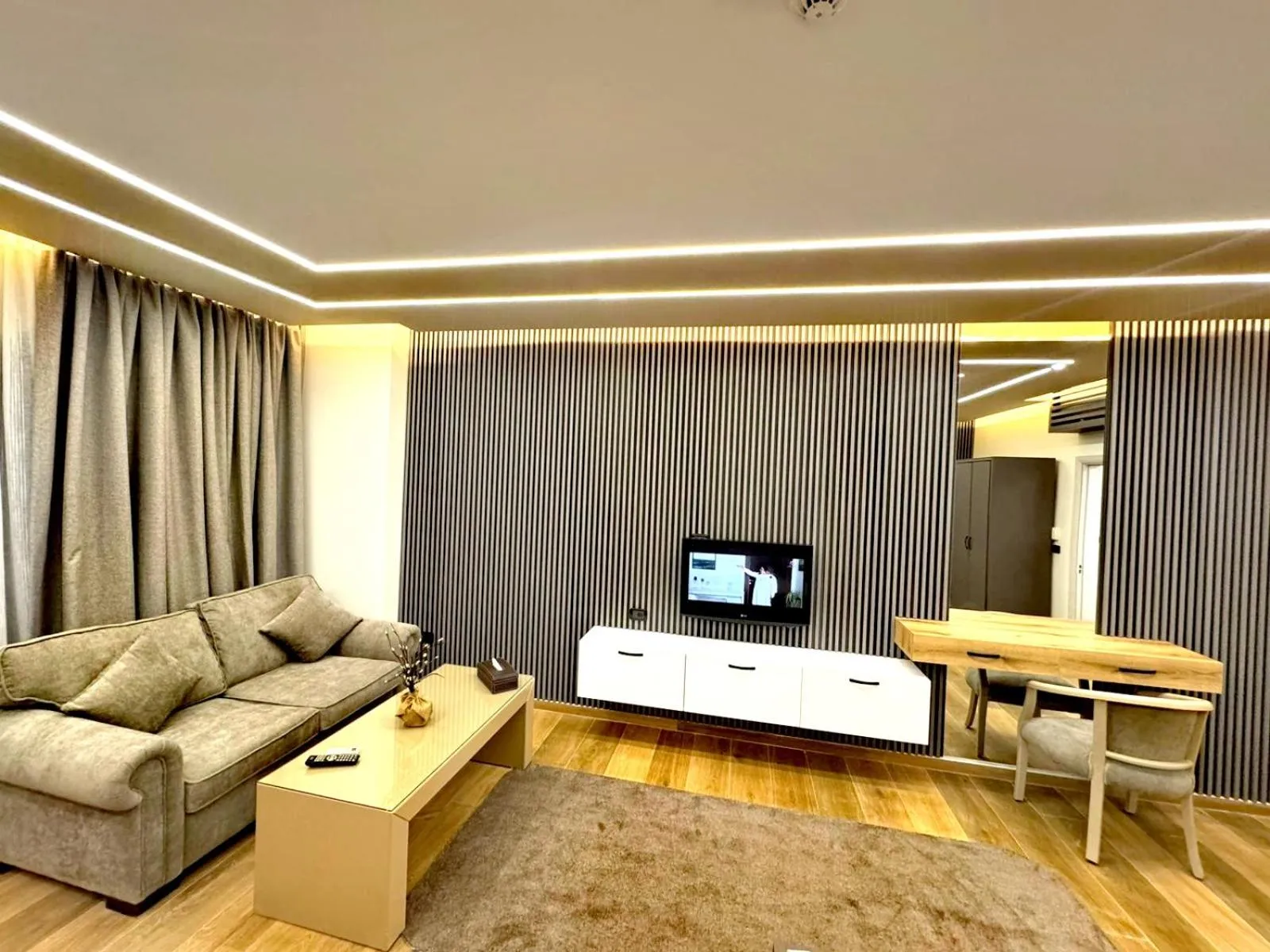 Seating area in Queens Suite Hotel