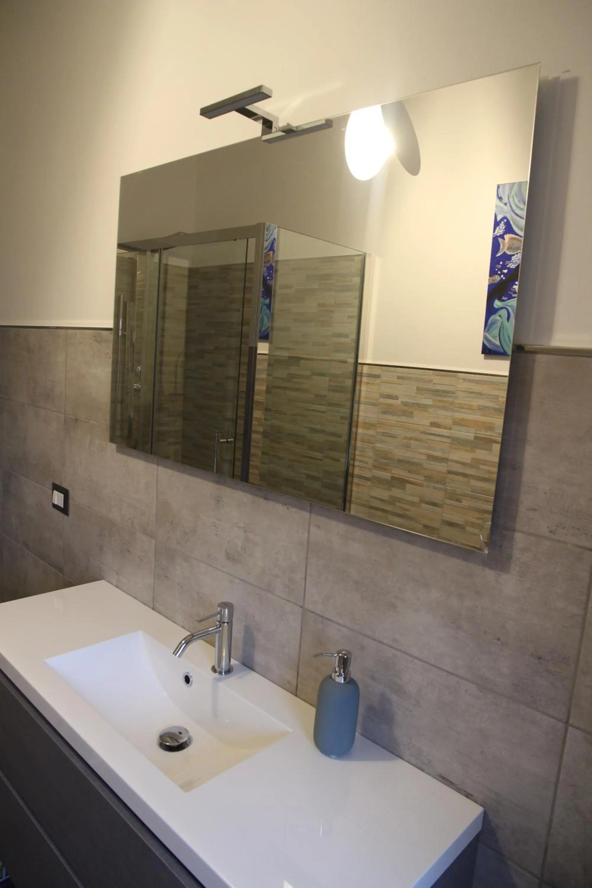 Bathroom in ES - Essential Solution & Emotion Stories (locazione turistica)