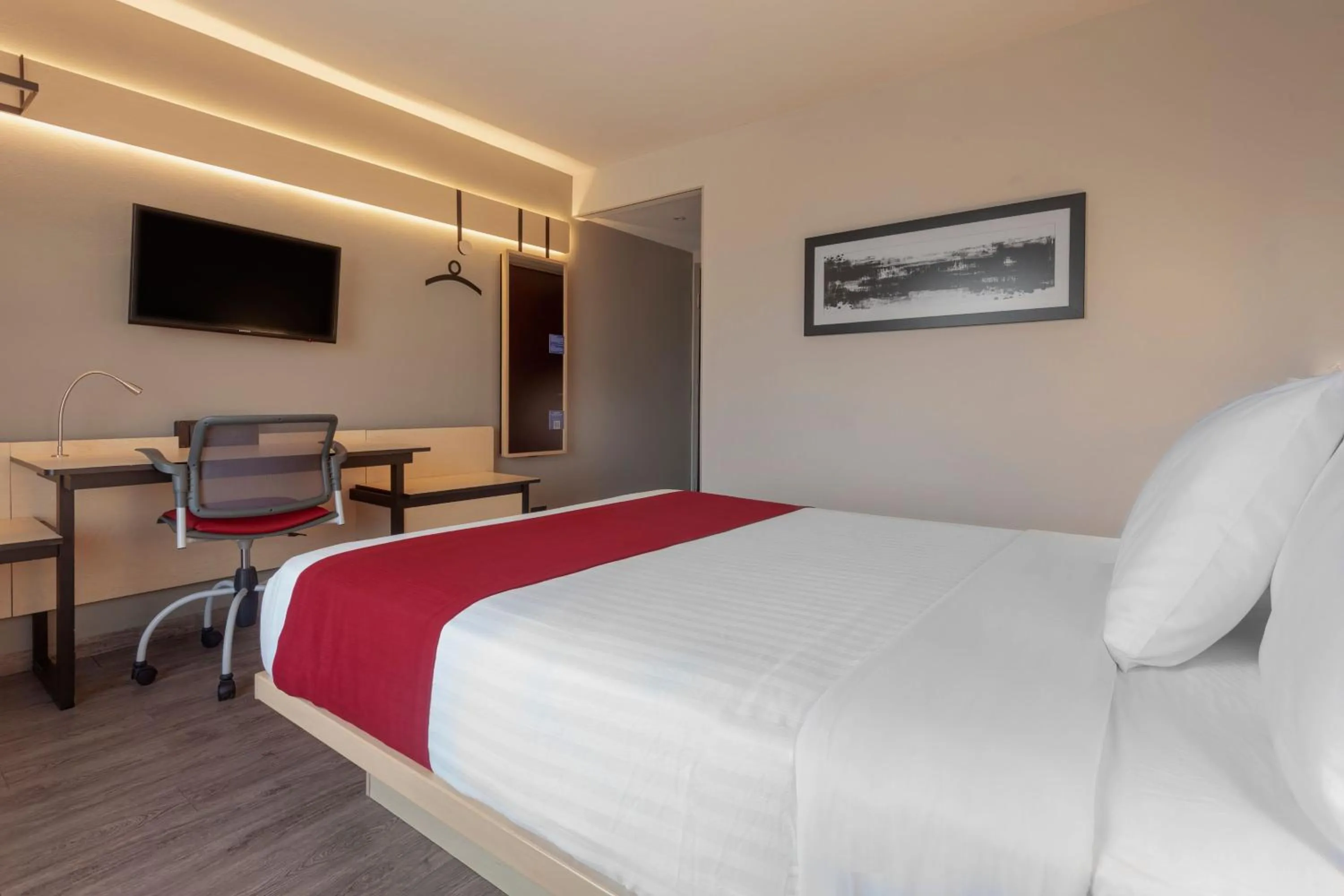 Photo of the whole room, Bed in City Express by Marriott Leon