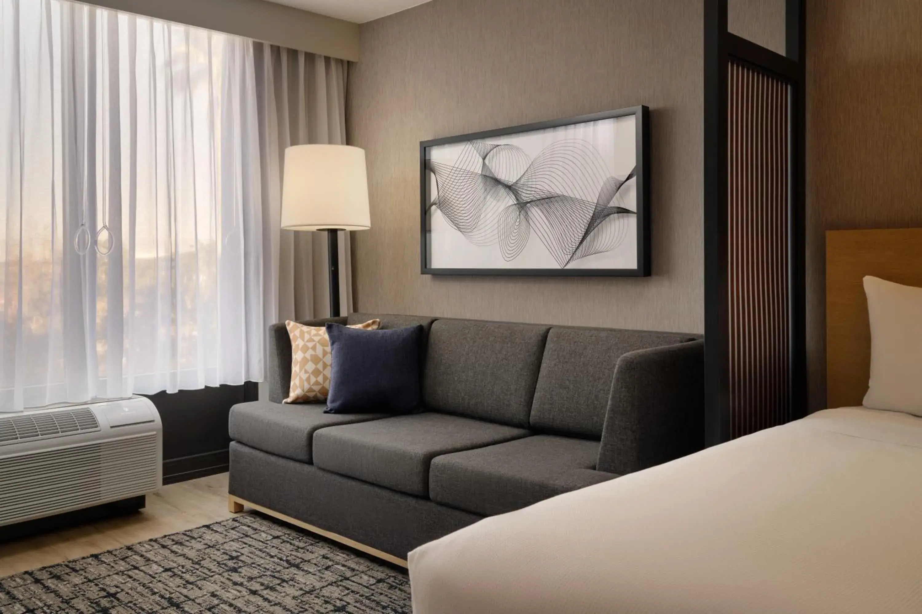 Living room, Bed in Hyatt Place Tampa Airport/Westshore Living room, Bed in Hyatt Place Tampa Airport/Westshore