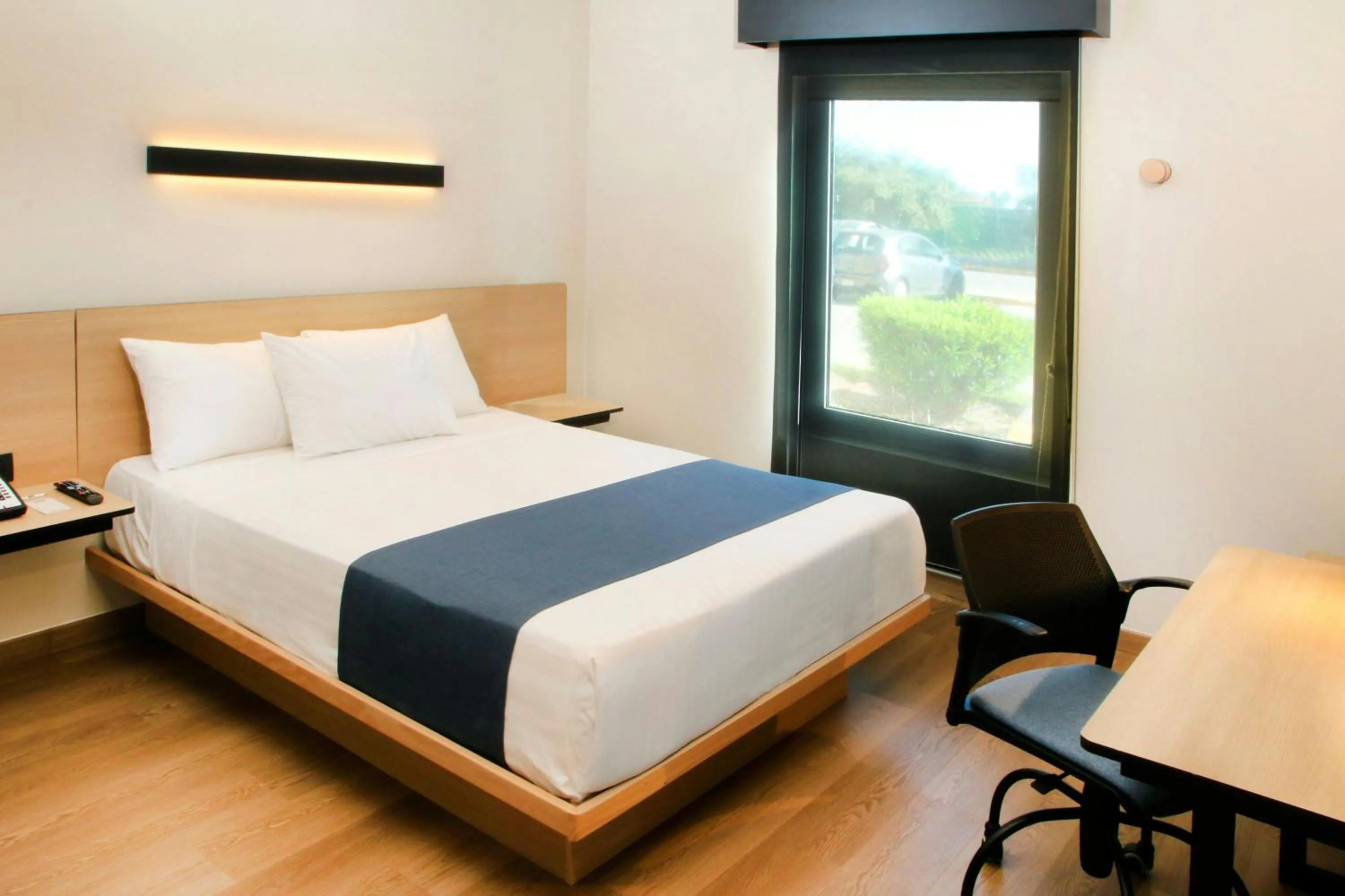 Photo of the whole room, Bed in City Express by Marriott Reynosa