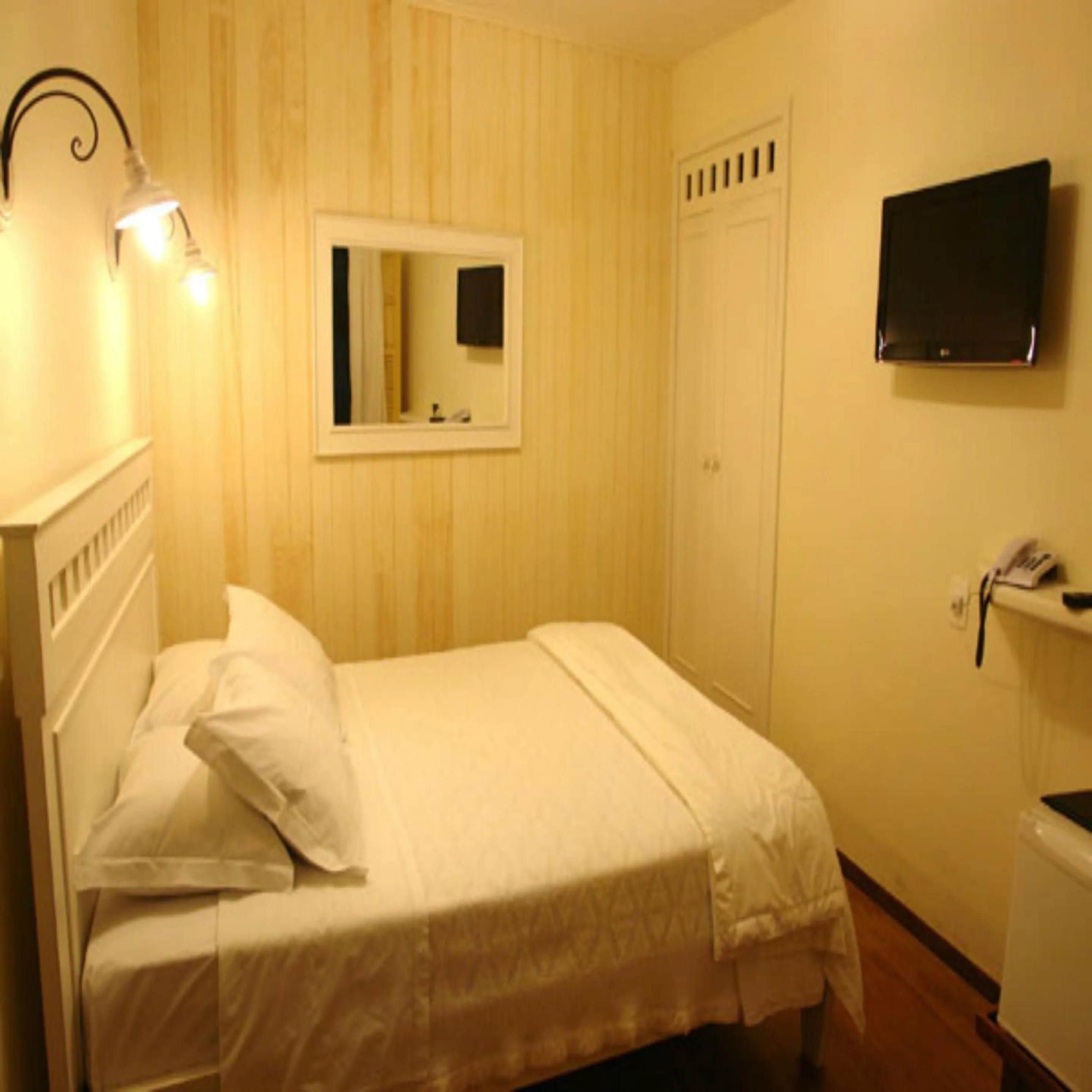 Bed in Pousada Villa Magnolia