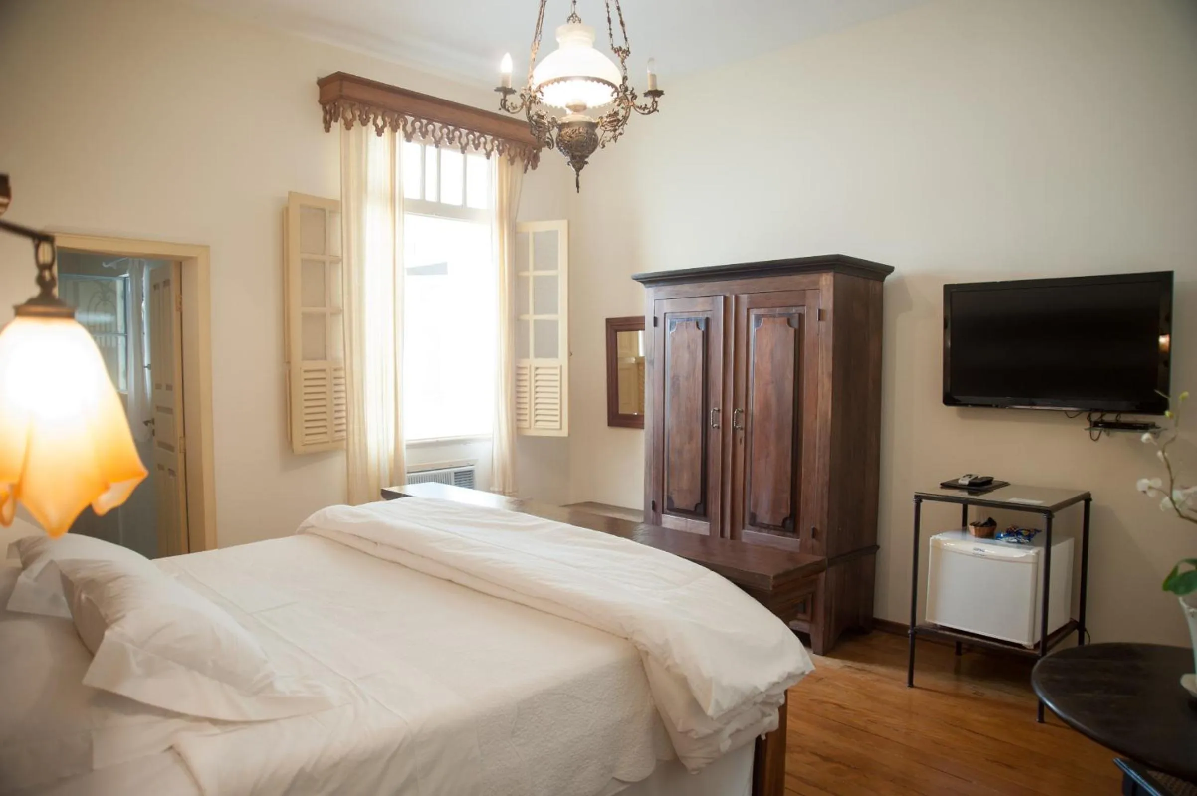 TV and multimedia, Bed in Pousada Villa Magnolia