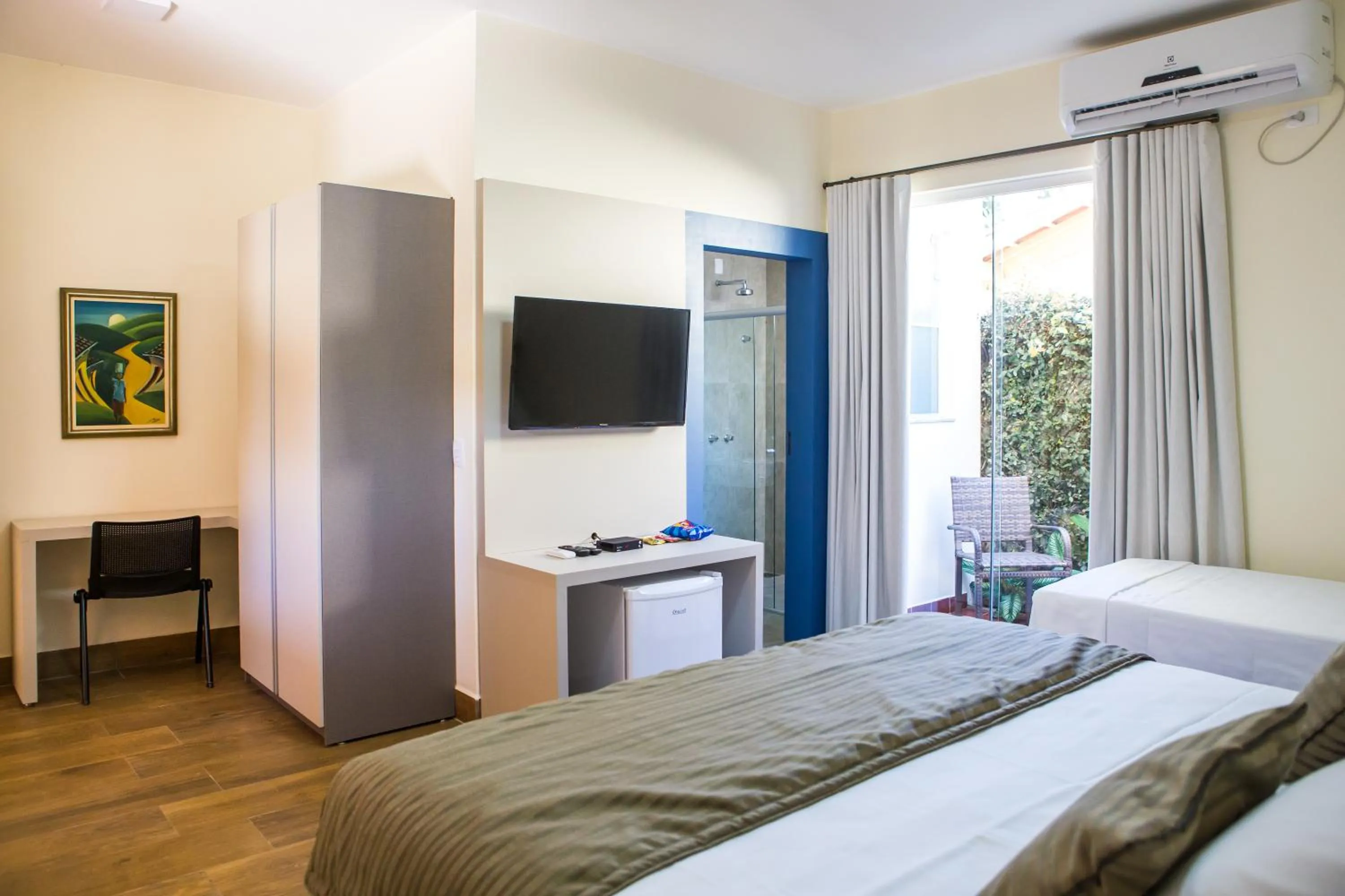 Photo of the whole room, Bed in Pousada Villa Magnolia